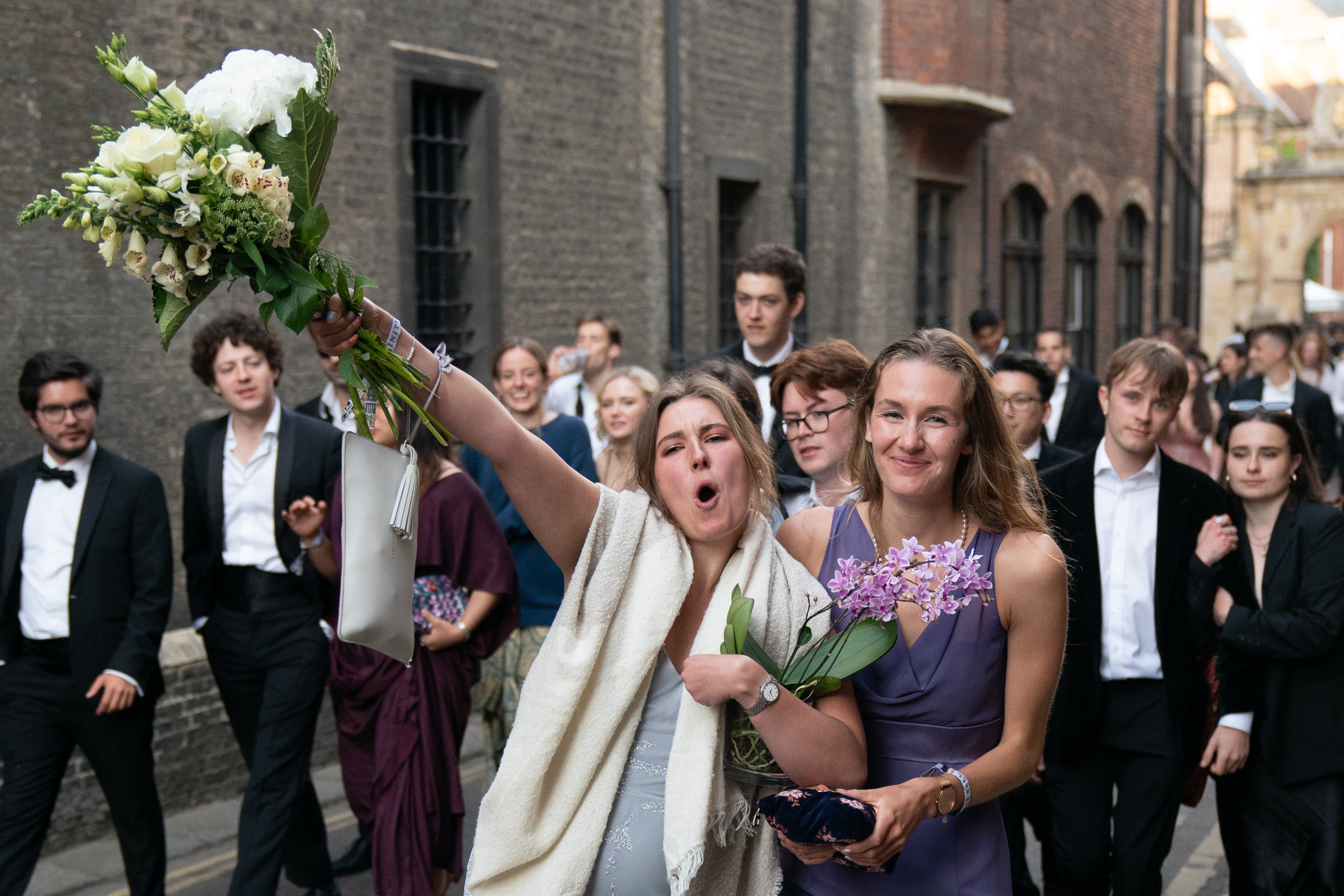 Students from Cambridge University make their way home (Joe Giddens/PA)