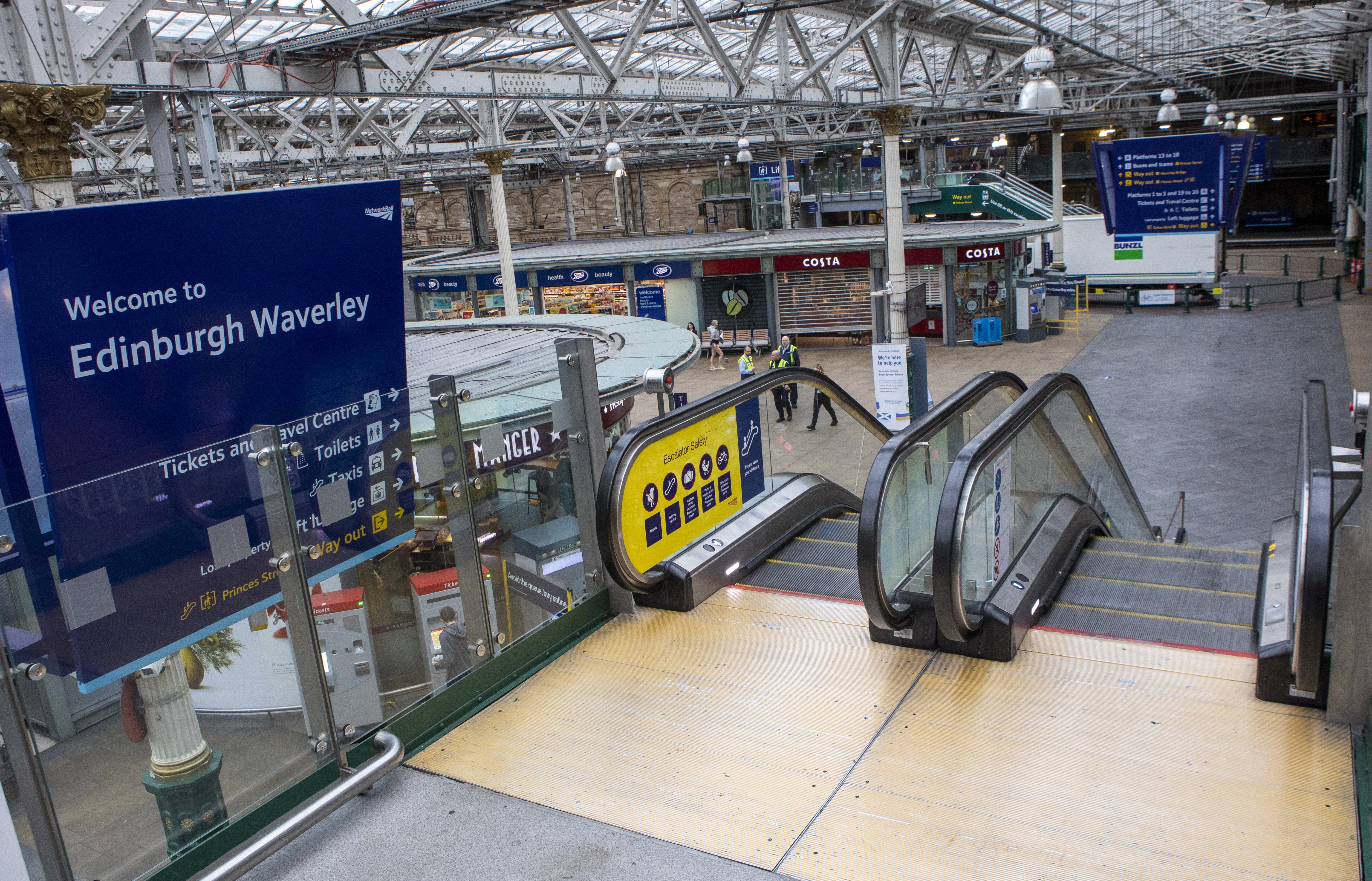 Morning rush hour at Edinburgh’s Waverley Station is a quiet affair