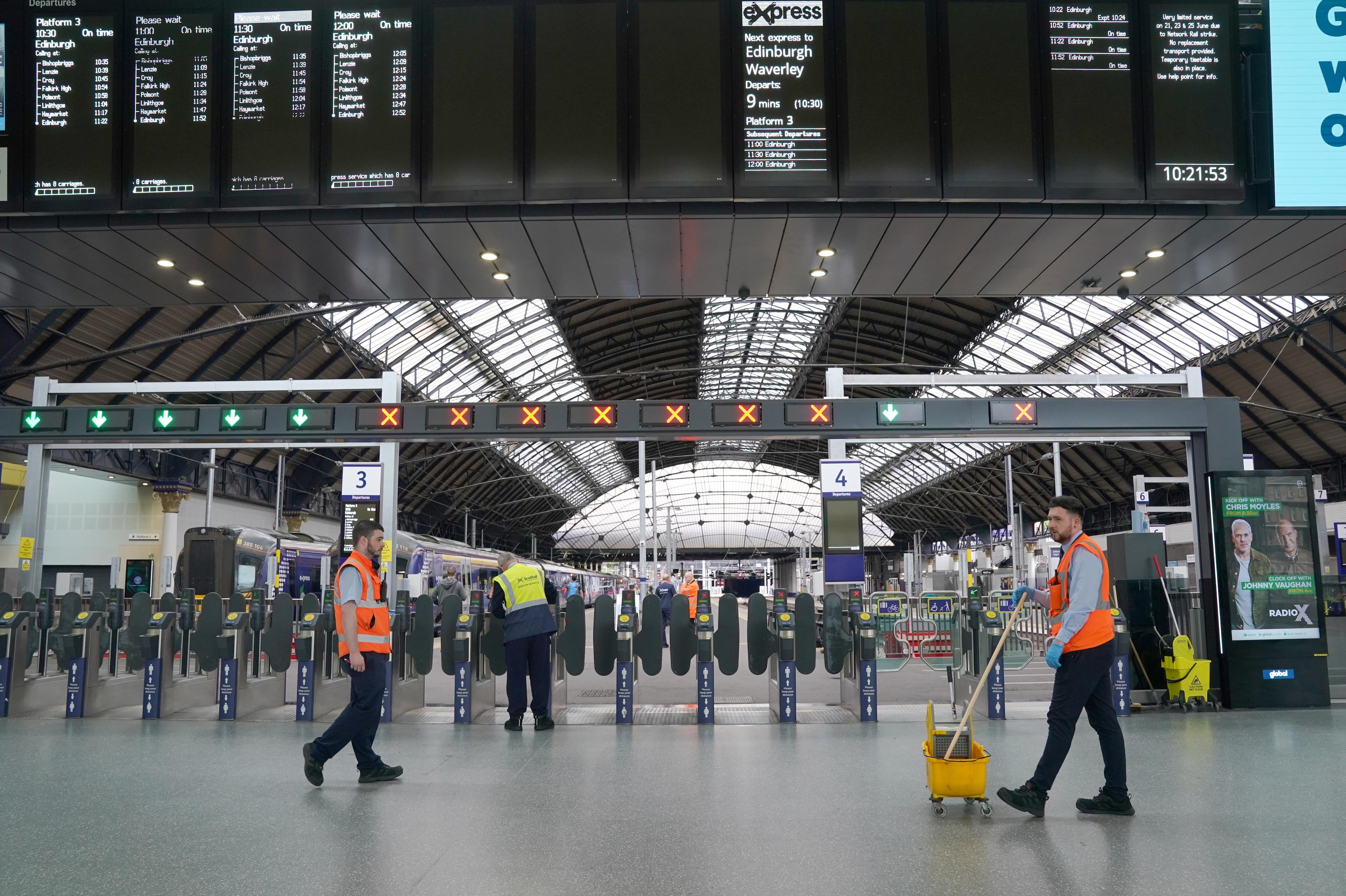 A quiet Glasgow Queen Street on Tuesday as members of the Rail, Maritime and Transport union begin their nationwide strike (Andrew Milligan/PA)