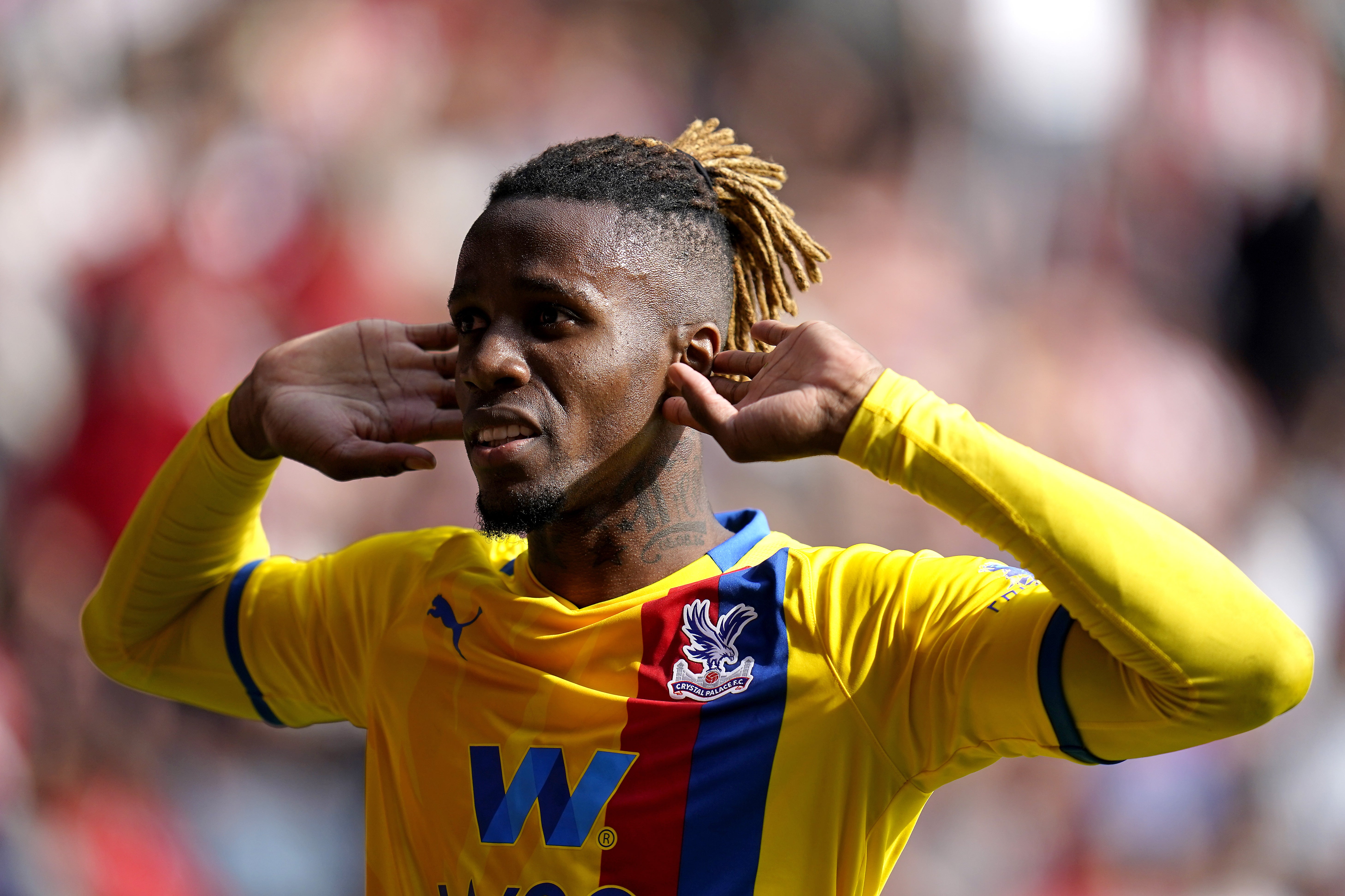 Wilfried Zaha has been swimming with sharks (Andrew Matthews/PA)