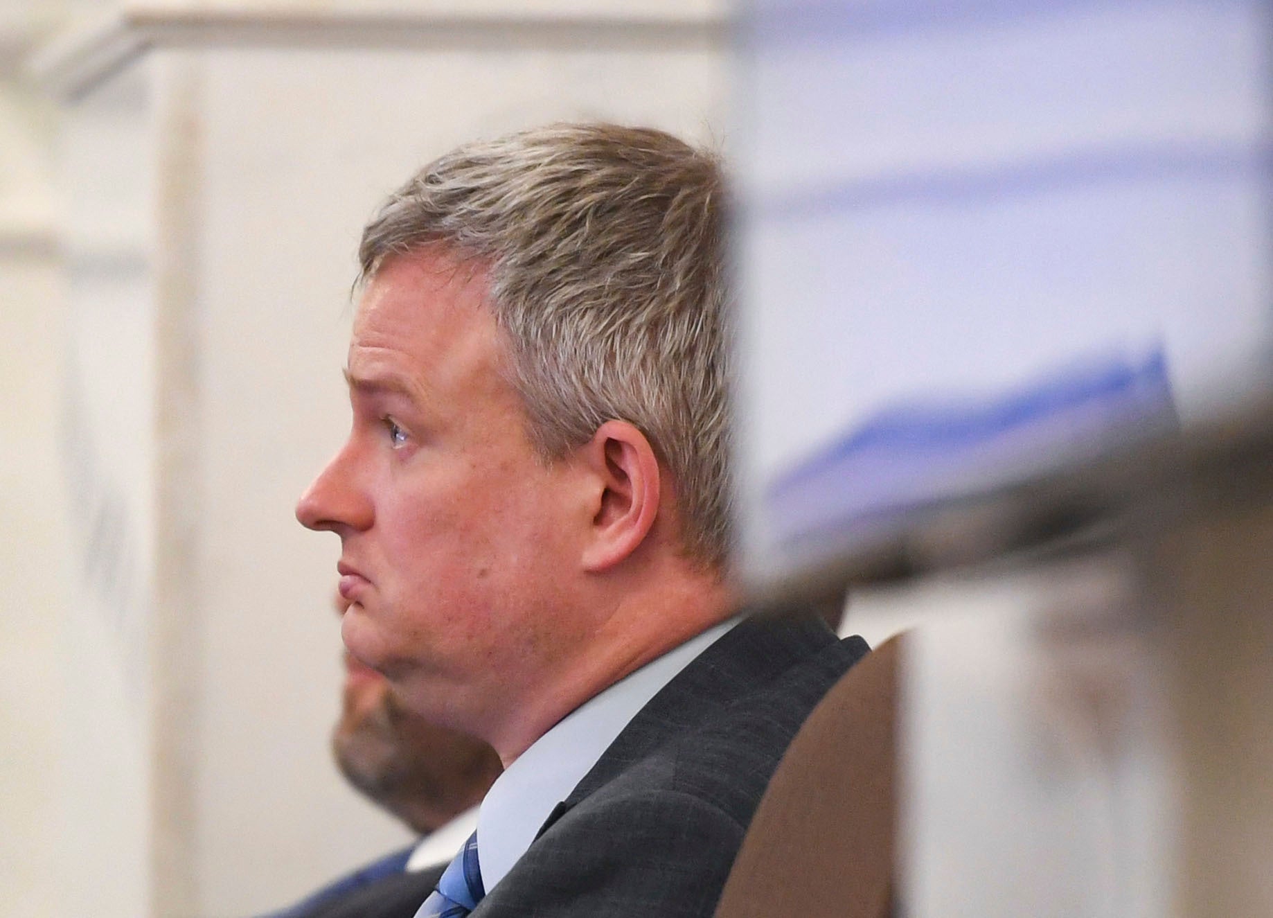 Attorney General Jason Ravnsborg listens from the defence table during his impeachment trial at the South Dakota State Capitol in Pierre