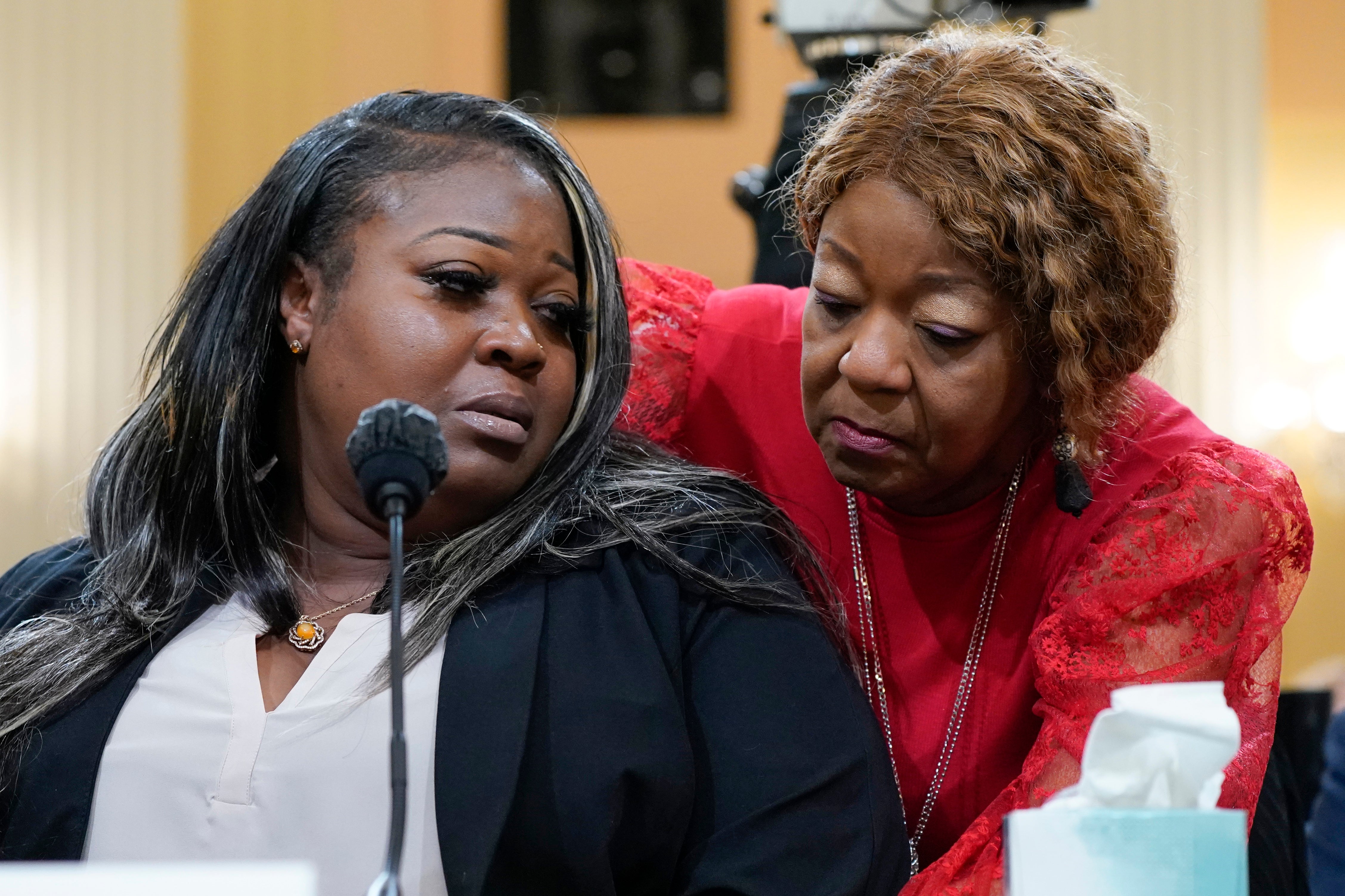 Wandrea ‘Shaye’ Moss, a former Georgia election worker, is comforted by her mother Ruby Freeman, right, while giving evidence to the Jan 6 committee