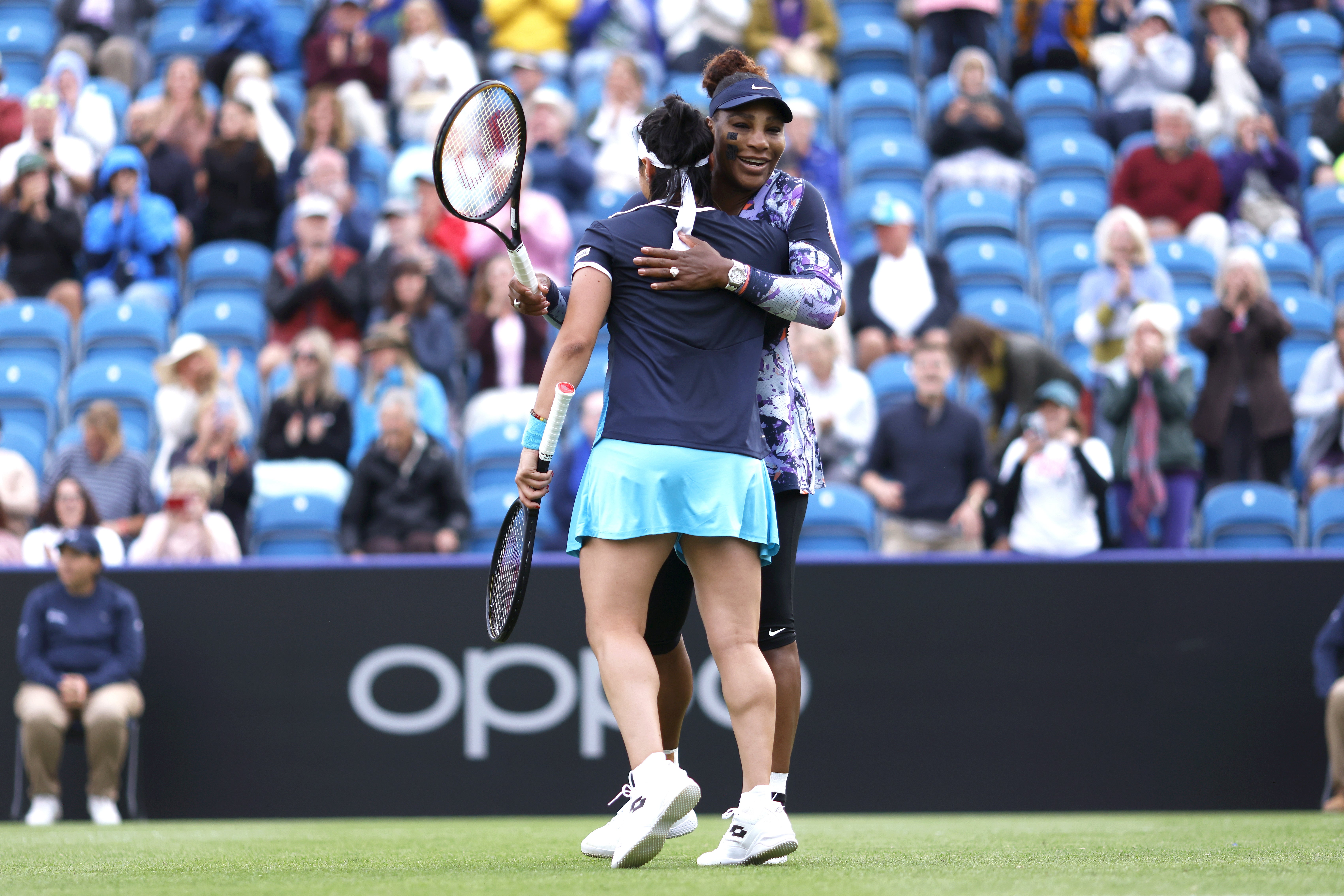 Serena Williams (right) celebrates with team-mate Ons Jabeur after registering a first round win in the Rothesay International Eastbourne (Steven Paston/PA)