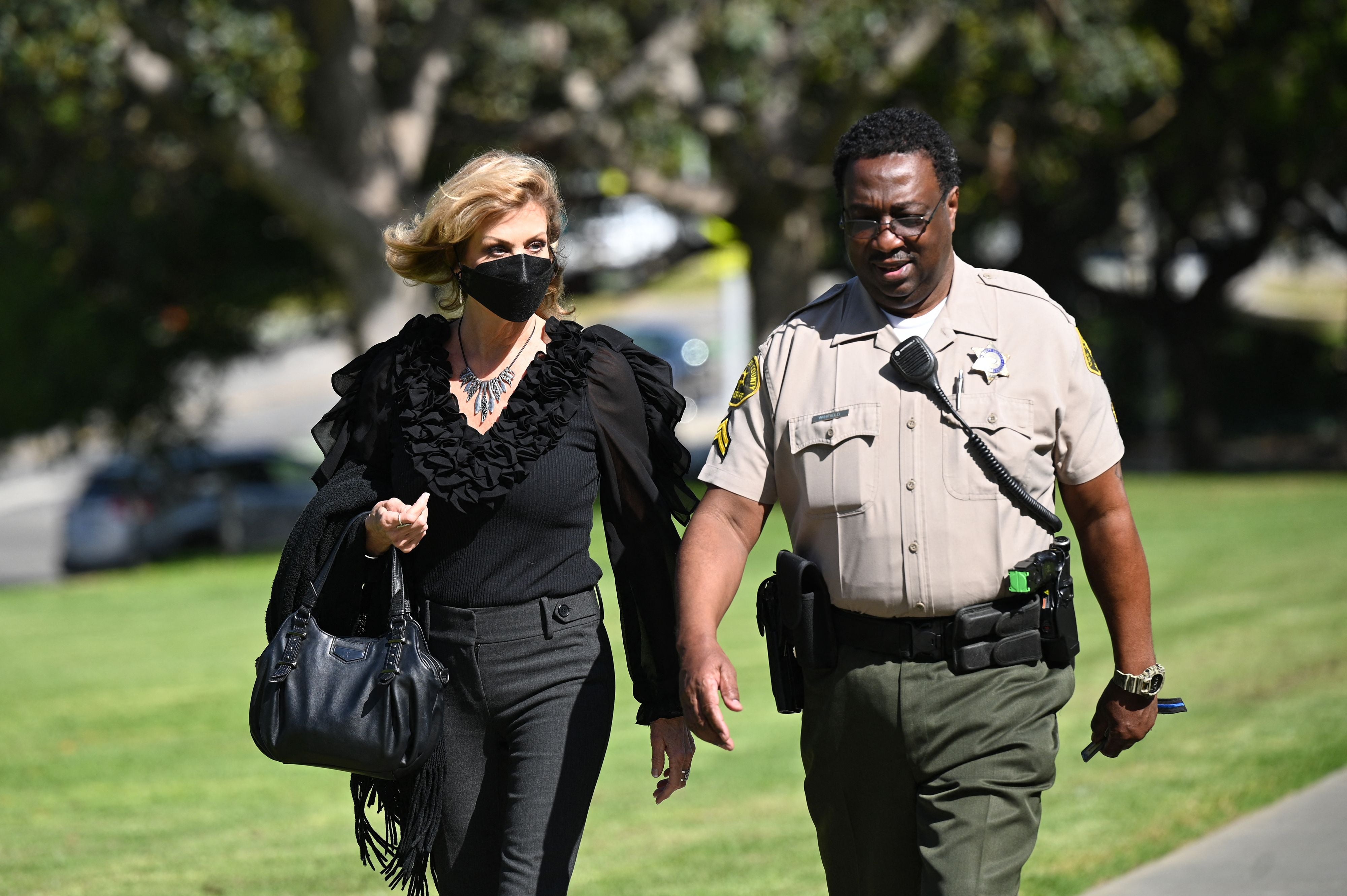 Plaintiff Judy Huth (L) arrives outside the courthouse for the start of her civil trial against actor Bill Cosby, on June 1, 2022 at Los Angeles Superior Court in Santa Monica, California.