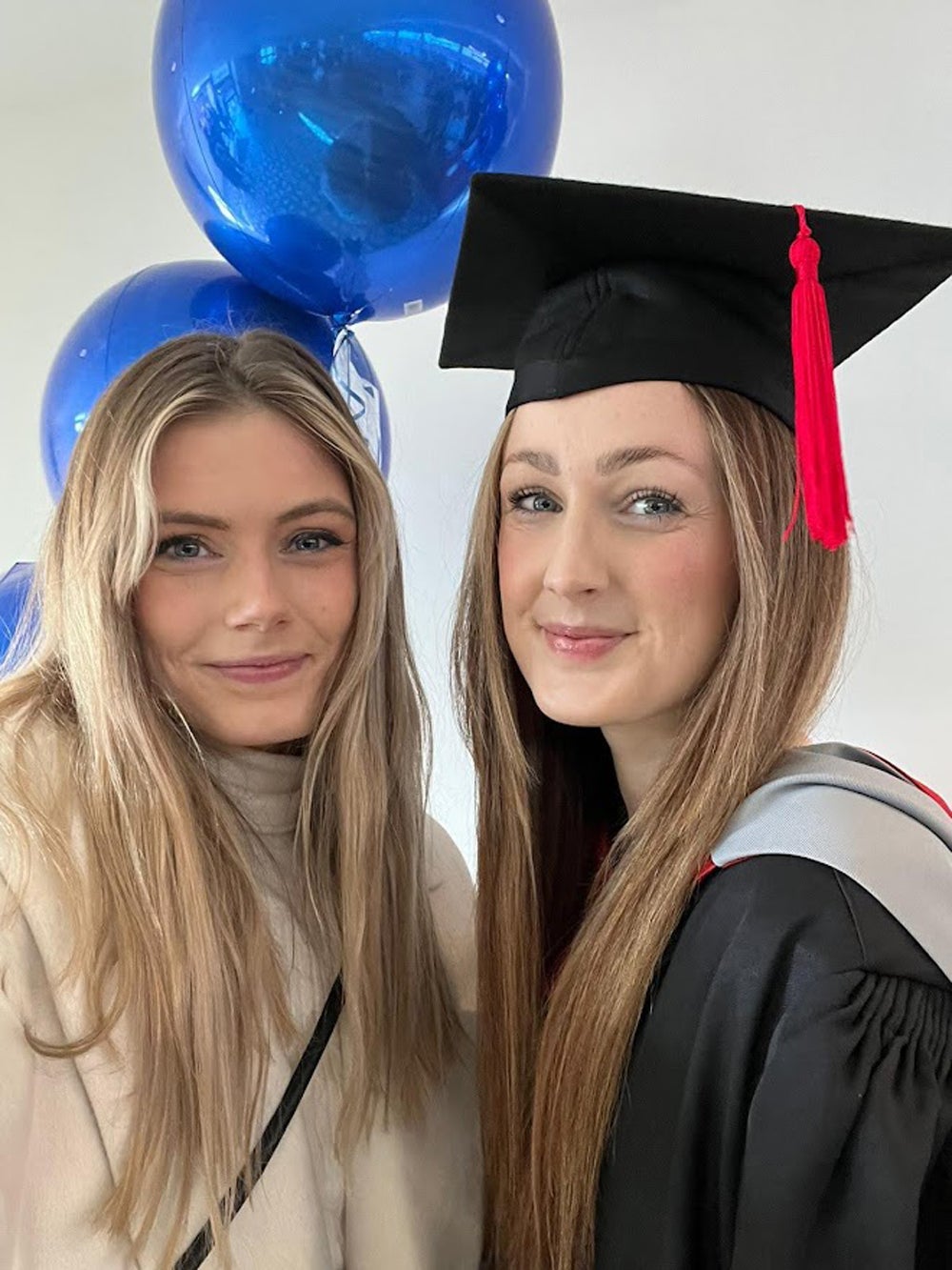 Laura and her sister Hollie at Laura’s graduation (PA Real Life/Collect)