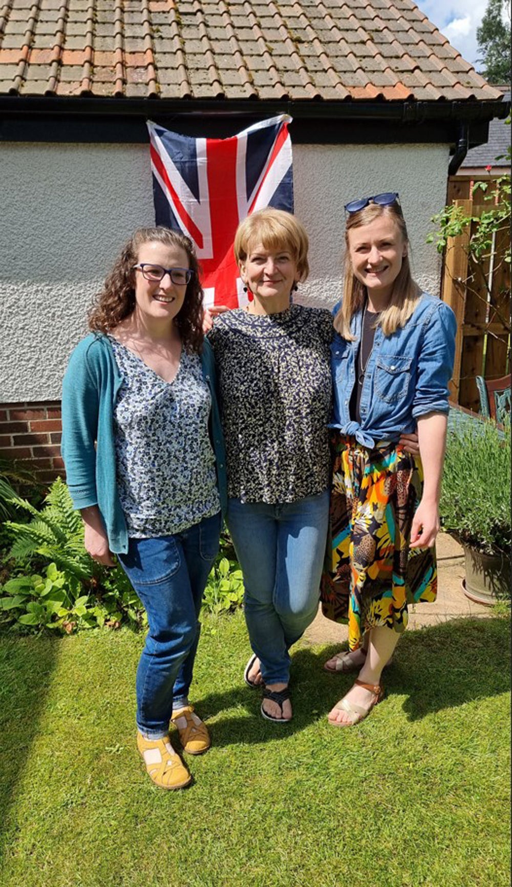 Christine Burnell, 59, with her partner’s daughters Clare Garman, 38, and Lisa McGuckin, 33, for the Queen’s Jubilee this year (Collect/PA Real Life)