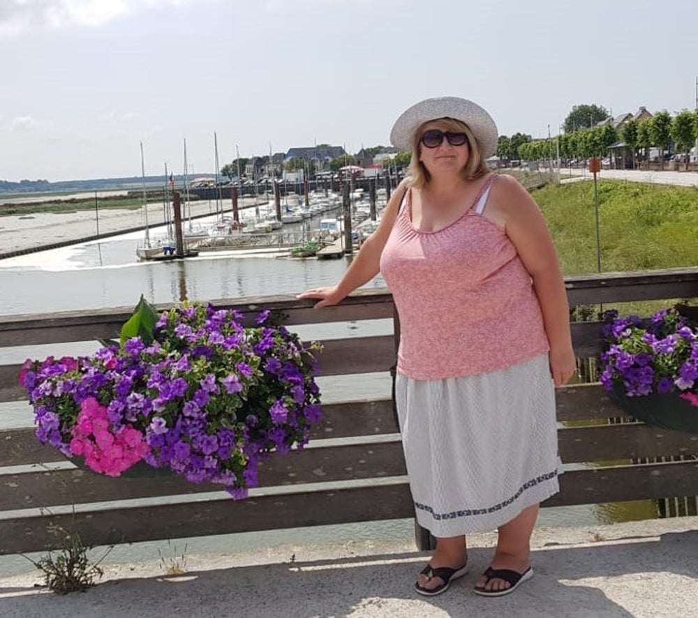 Christine Burnell weighing 19st on holiday four the Tour De France in July 2019 (Collect/PA Real Life)