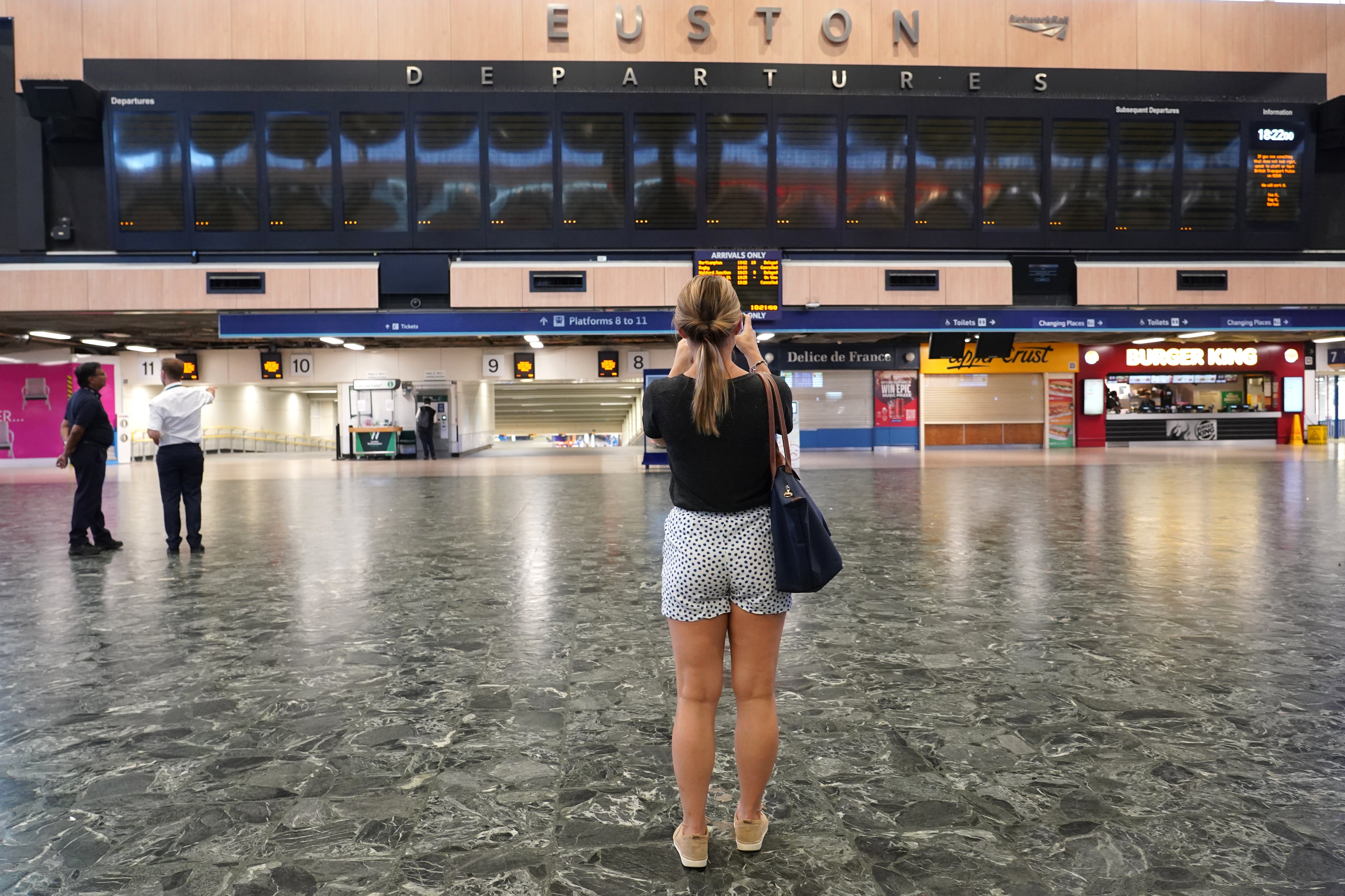 Train stations across the country were deserted on Tuesday, putting pressure on other transport services (Ian West/PA)