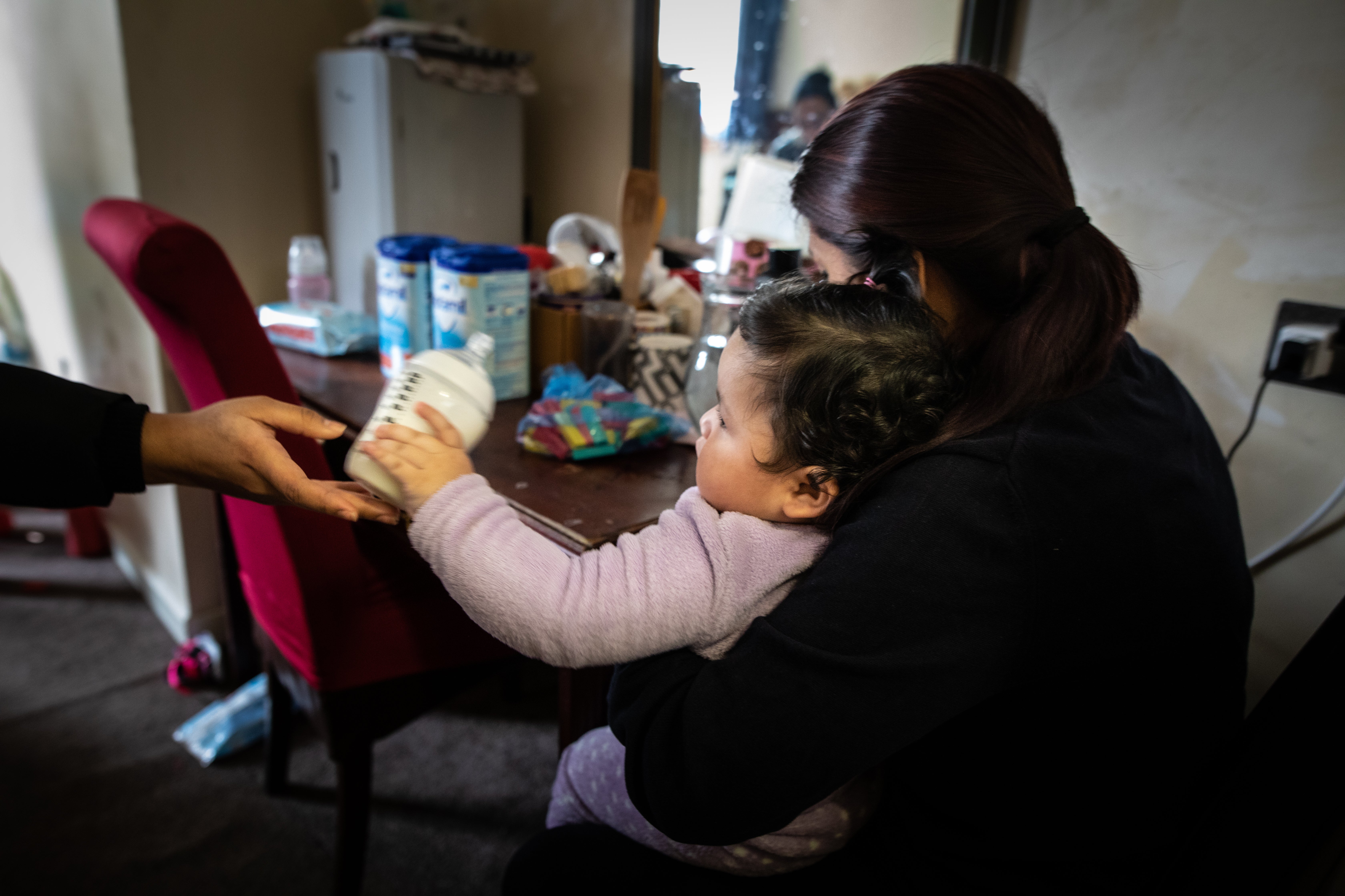 Aline and Carlos have struggled to get the right baby formula for their children