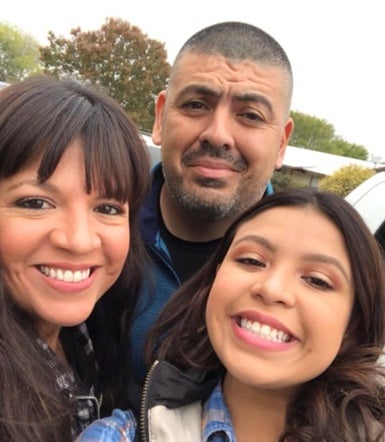 Robb Elementary School teacher Eva Mireles (left) with her husband Officer Ruben Ruiz (centre) and their daughter Analynn Ruiz (right)