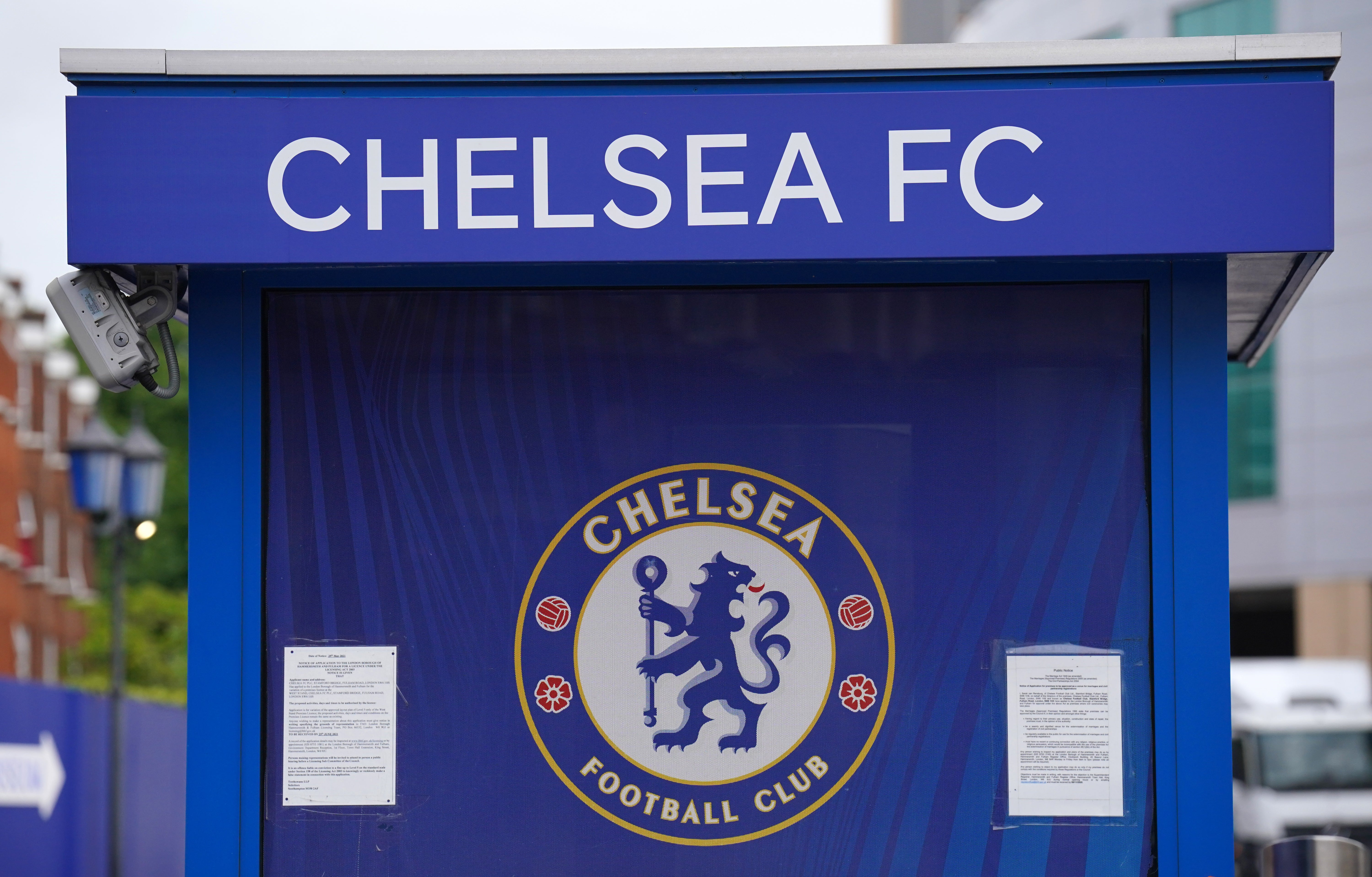 A programme stall outside Stamford Bridge, home of Chelsea FC (PA)