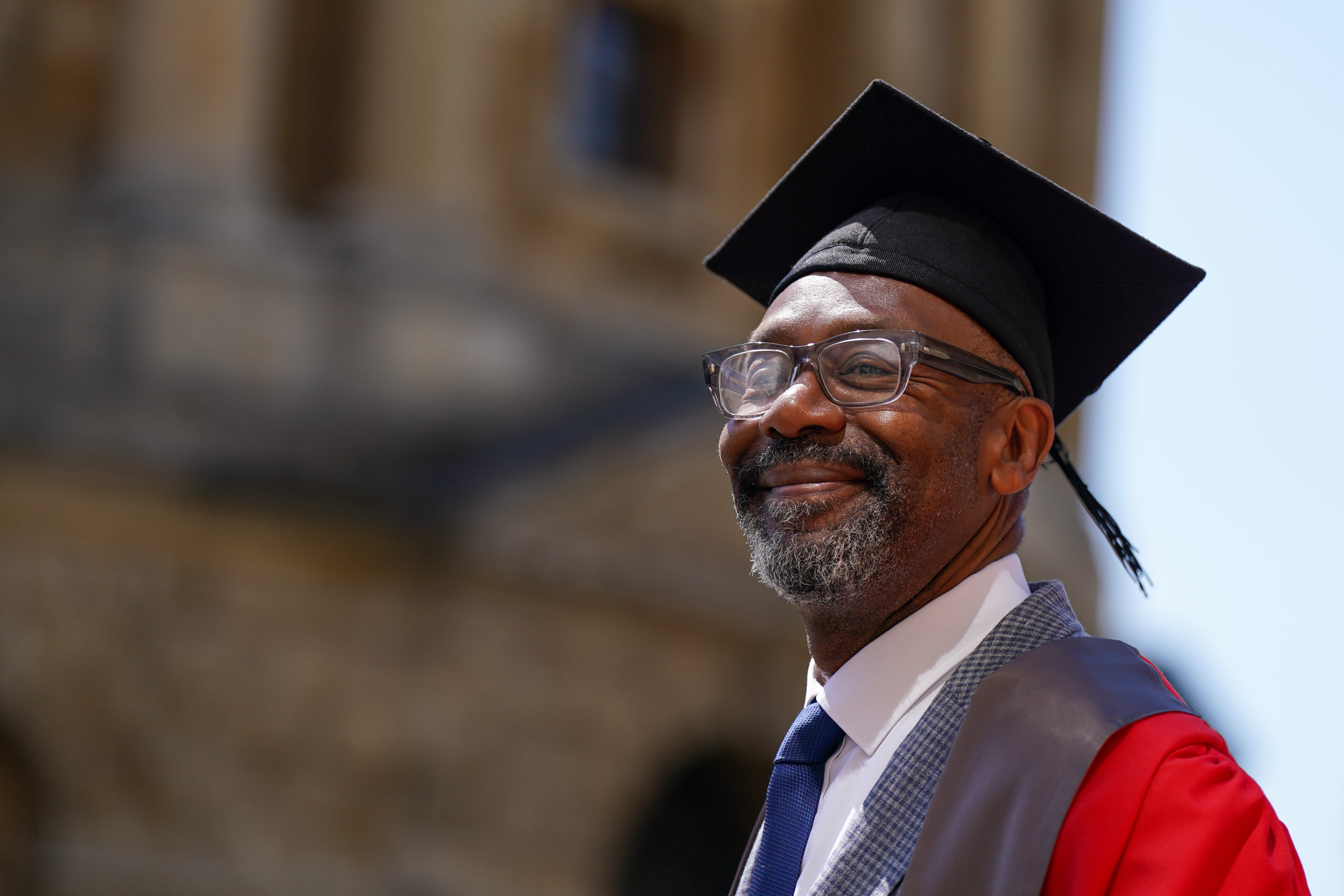 Sir Lenny Henry walks in a procession ahead of receiving an honorary degree from Oxford University at a ceremony at Sheldonian Theatre, Oxford. (Jacob King/PA)