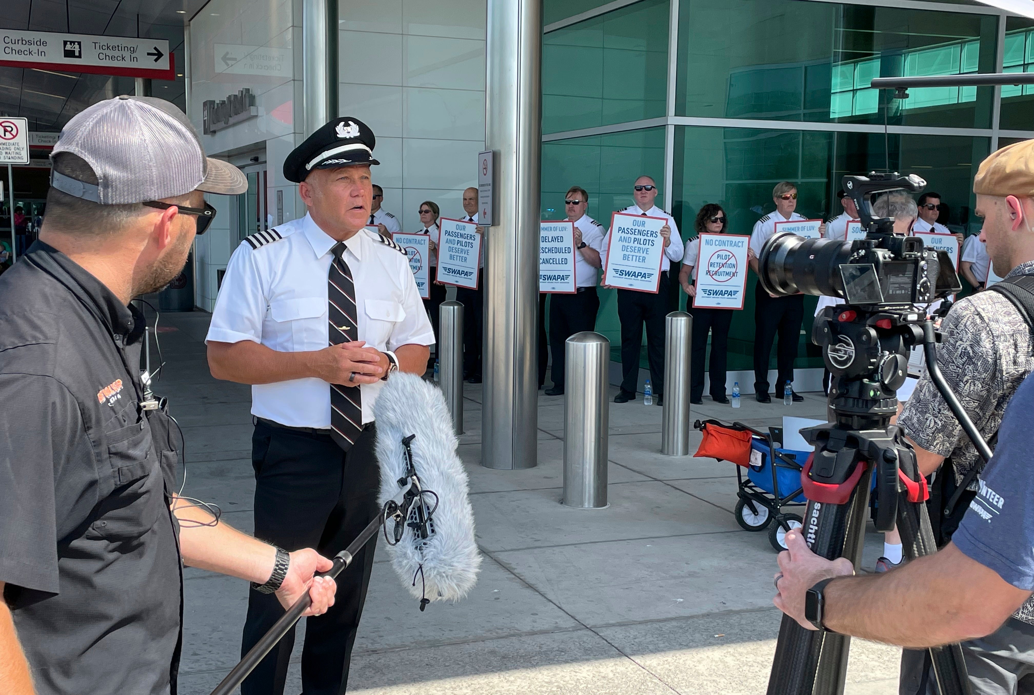 Casey A Murray, a pilot and the president of the Southwest Airlines Pilots Association, addressing media during picketing