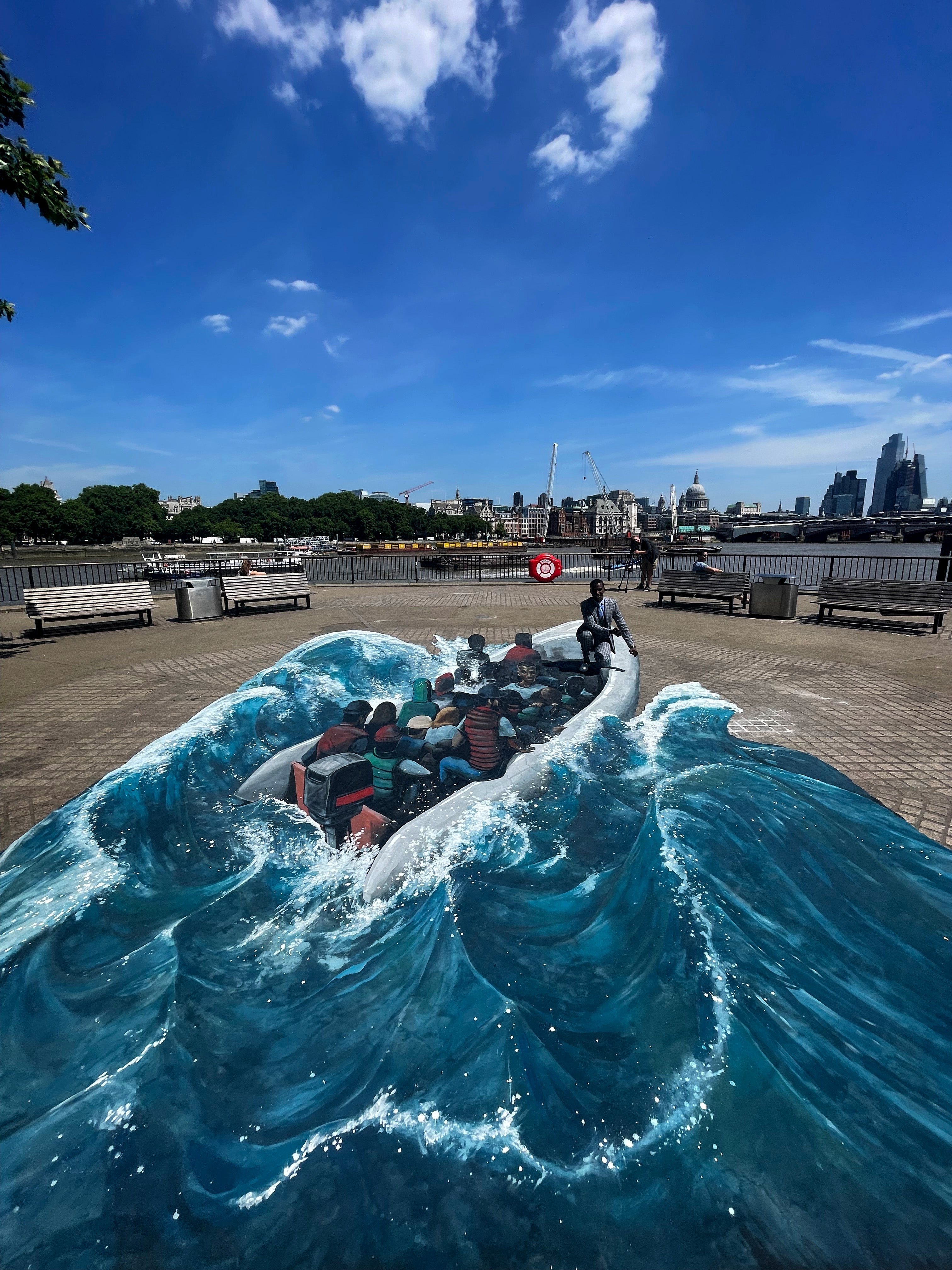 Three immersive artworks have been unveiled on London’s Southbank, depicting Ethiopian refugee Eskander Turki’s journey to safety in the UK (Migrant Help/PA)