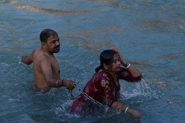 File photo: Millions of people take dip in holy rivers in India everyday