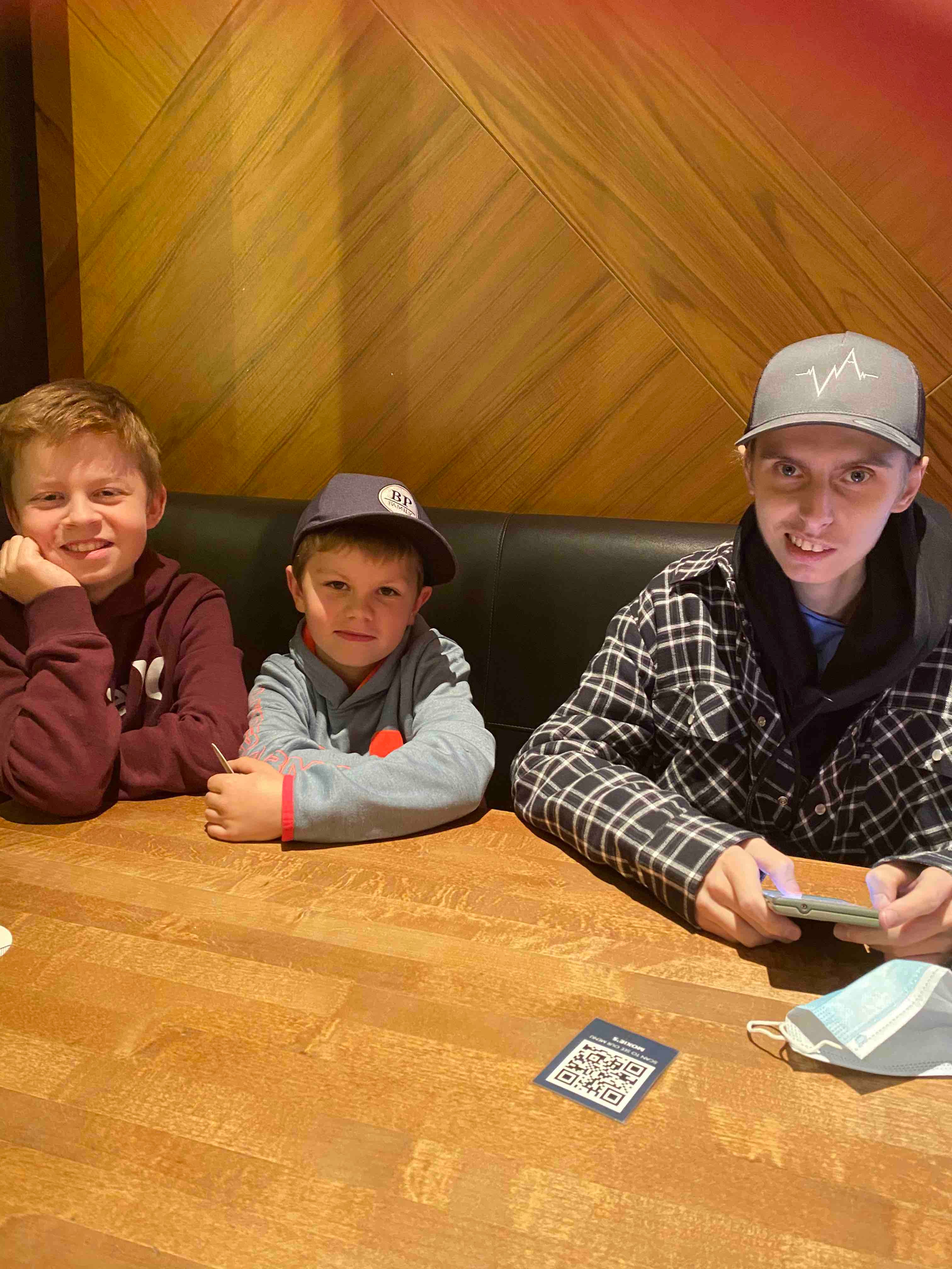 Eric Coulam and his two younger brothers while on a five-day family vacation they took in November 2020, one of the first excursions he was able to do after a months-long stay in an Alberta hospital