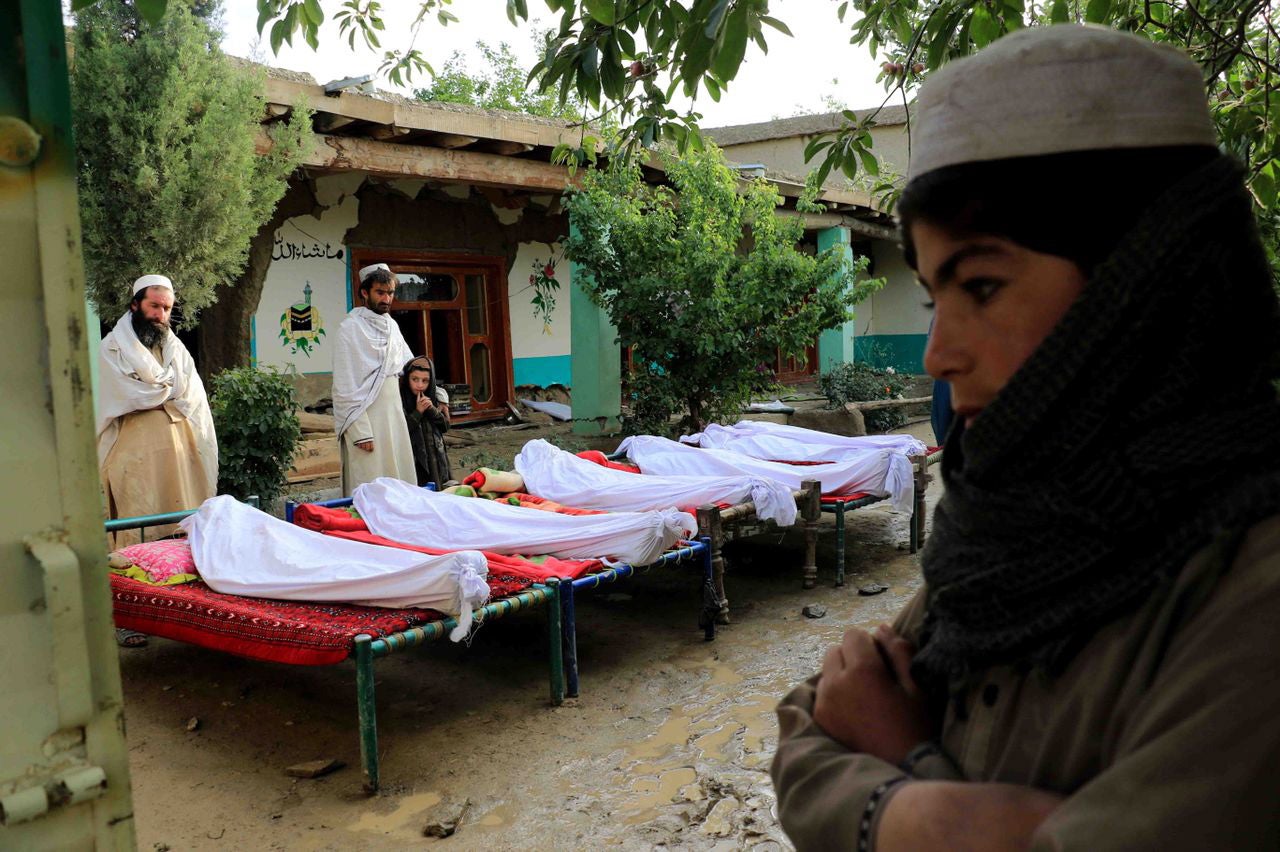 People attend funeral of the victims of earthquake in Gayan village in Paktia province