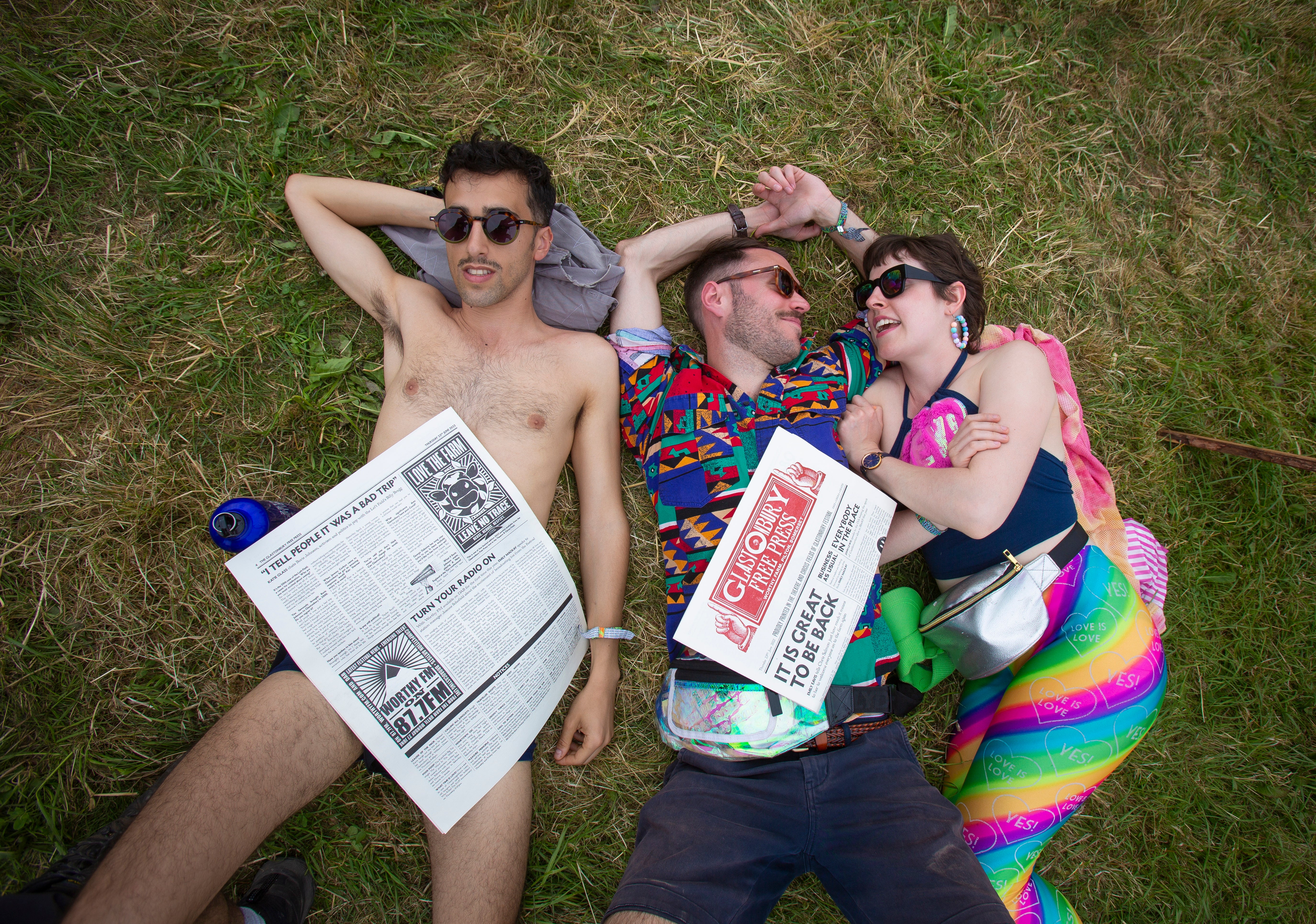 Festival-goers enjoy the sunshine