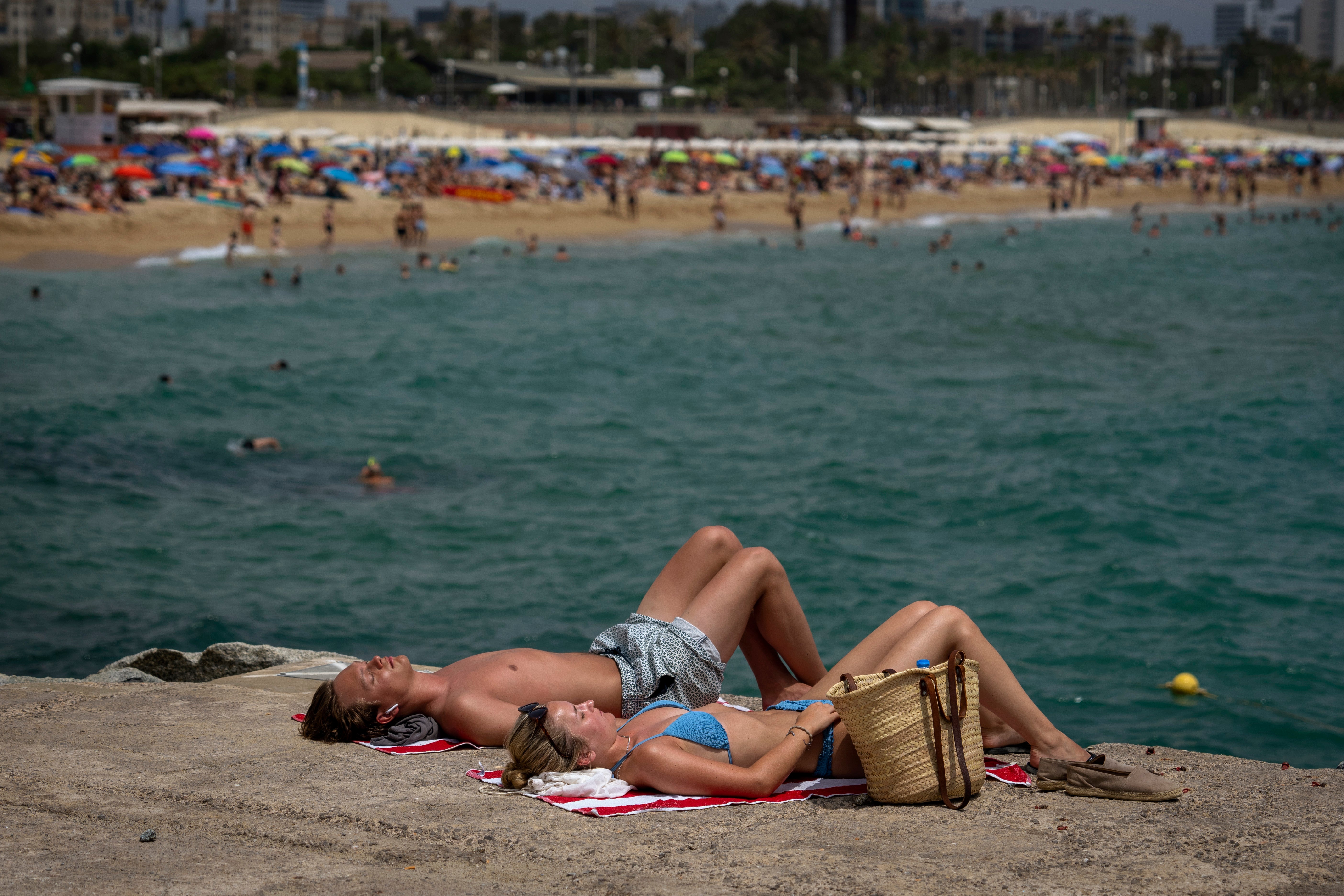 Catching rays: sunseekers in Barcelona