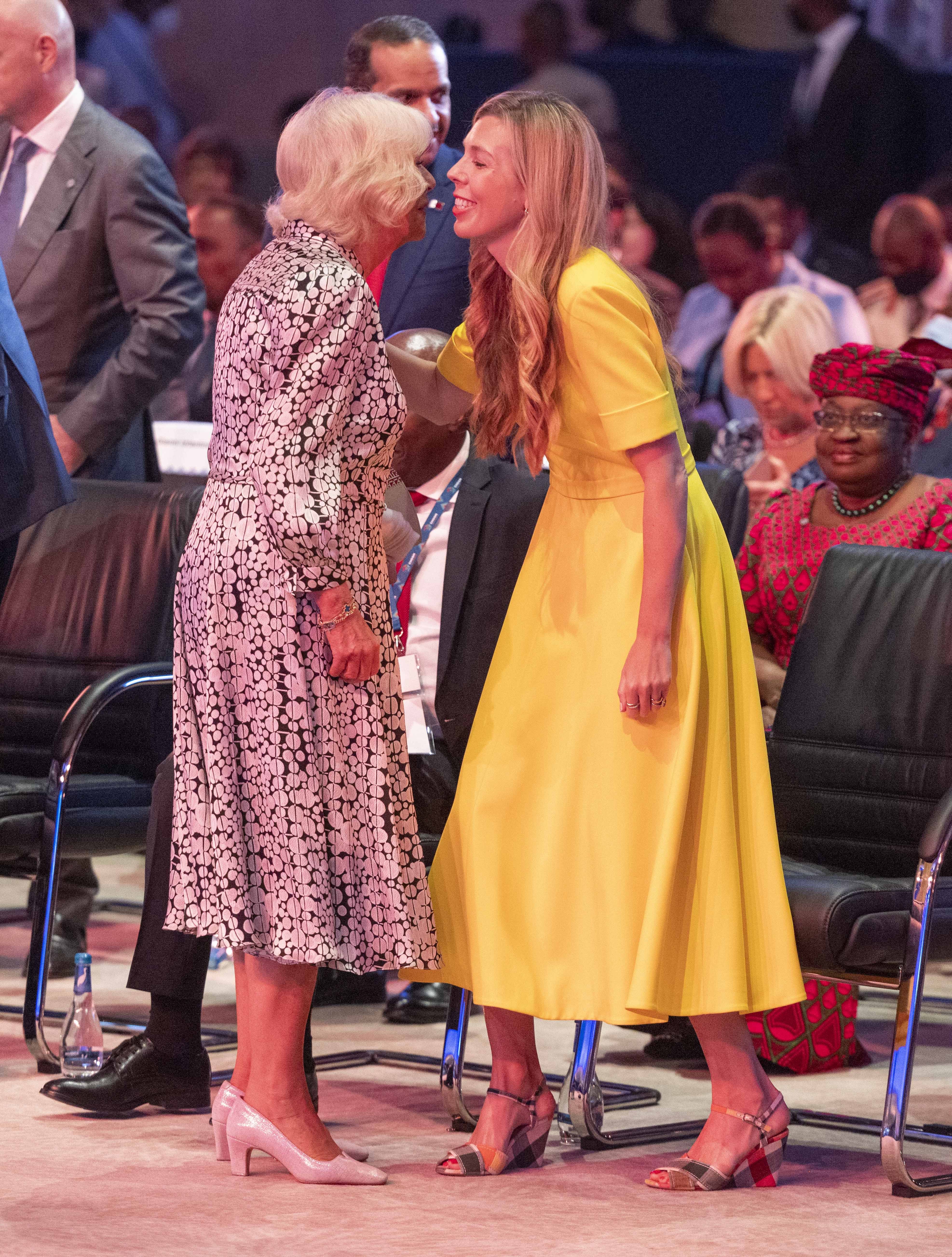 The Duchess of Cornwall and Carrie Johnson met in Rwanda as the latter’s husband faced another electoral defeat at home