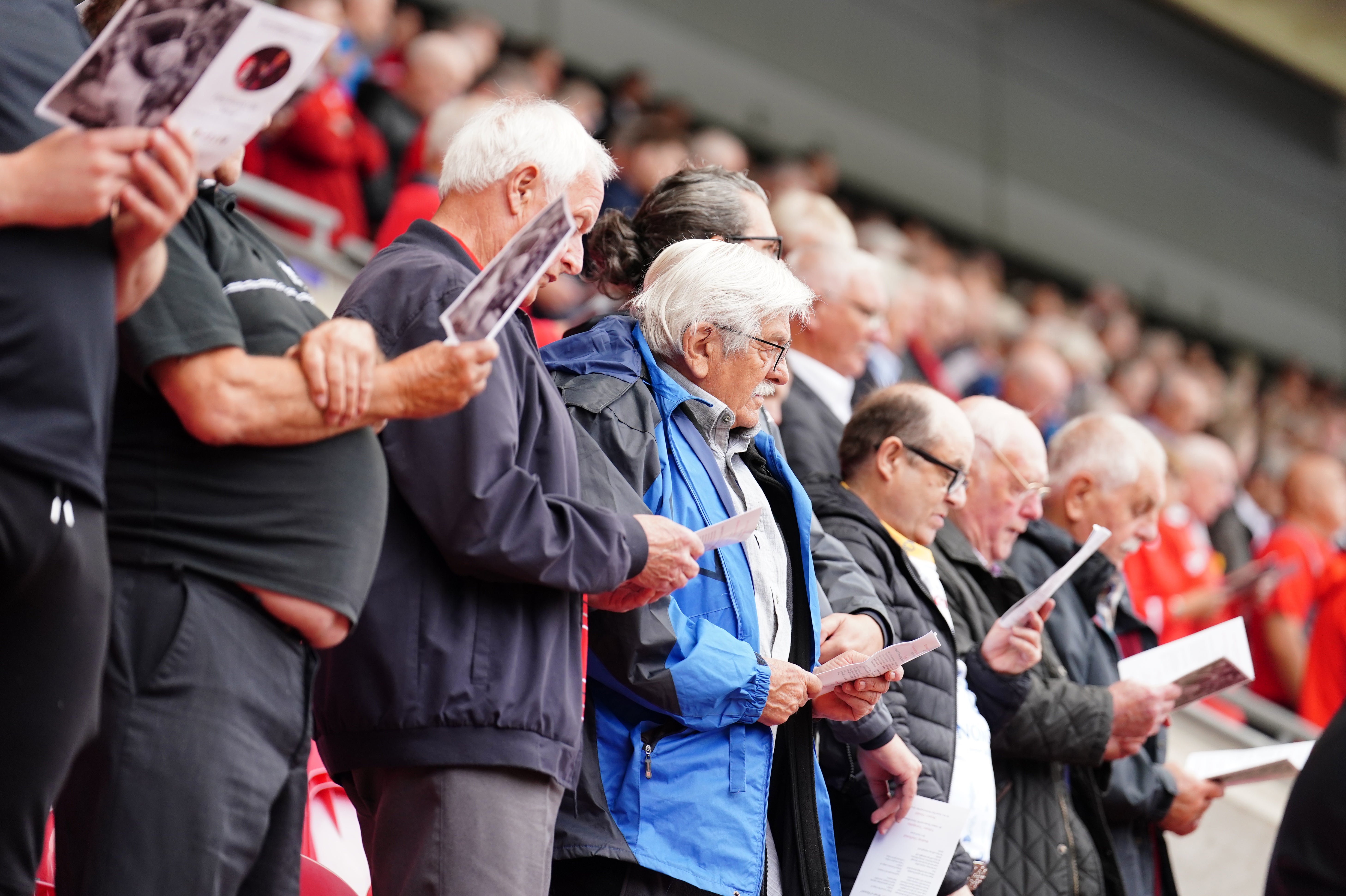 Fans pay their respects during the remembrance service for former Wales fly-half Phil Bennett (David Davies/PA)