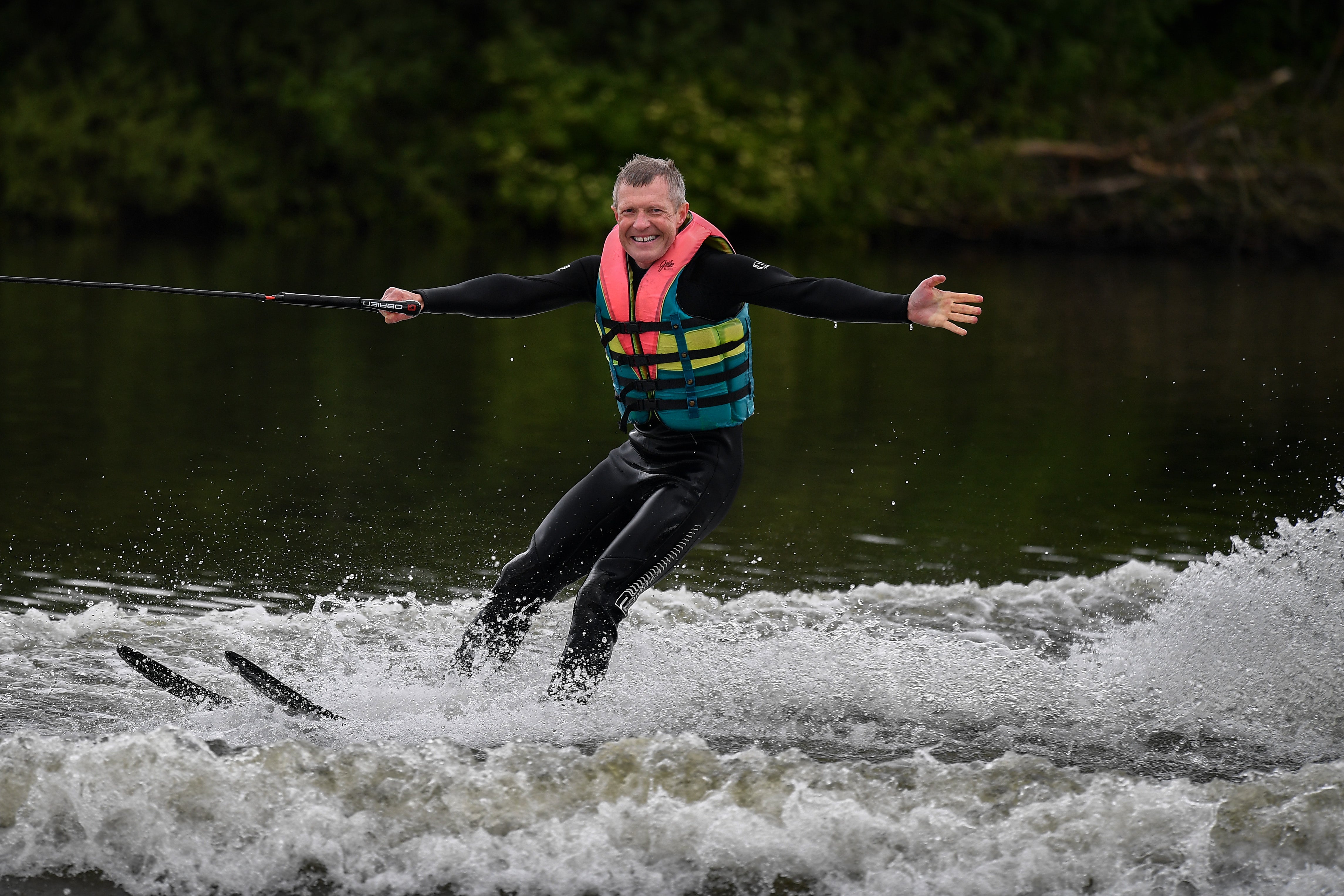 Willie Rennie, then leader of the Scottish Liberal Democrats, waterskis during a European election campaign event in 2021