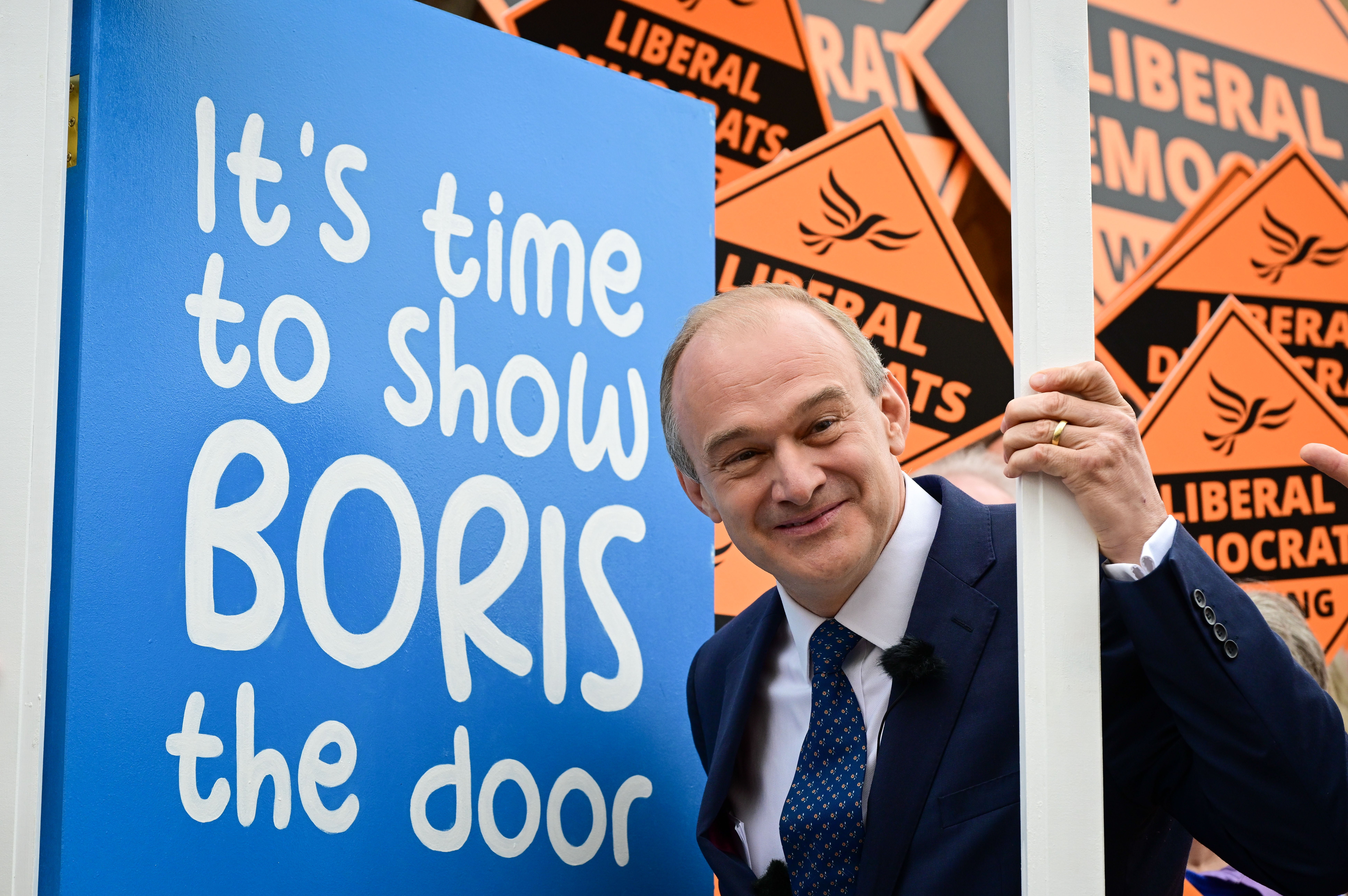 Liberal Democrat leader Ed Davey poses with a prop door on June 24, 2022 in Tiverton, England.