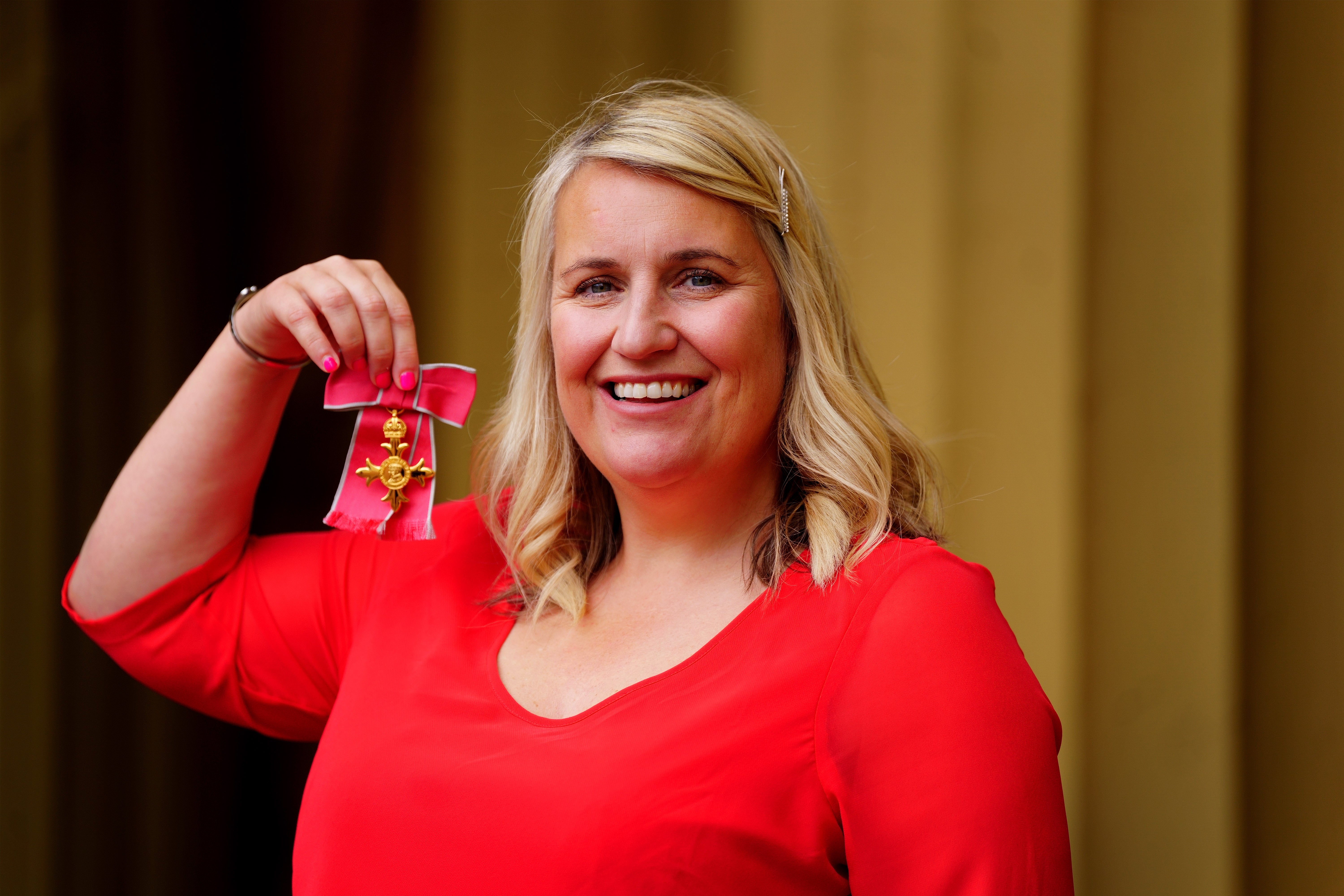 Chelsea Women’s manager Emma Hayes with her OBE (Victoria Jones/PA)