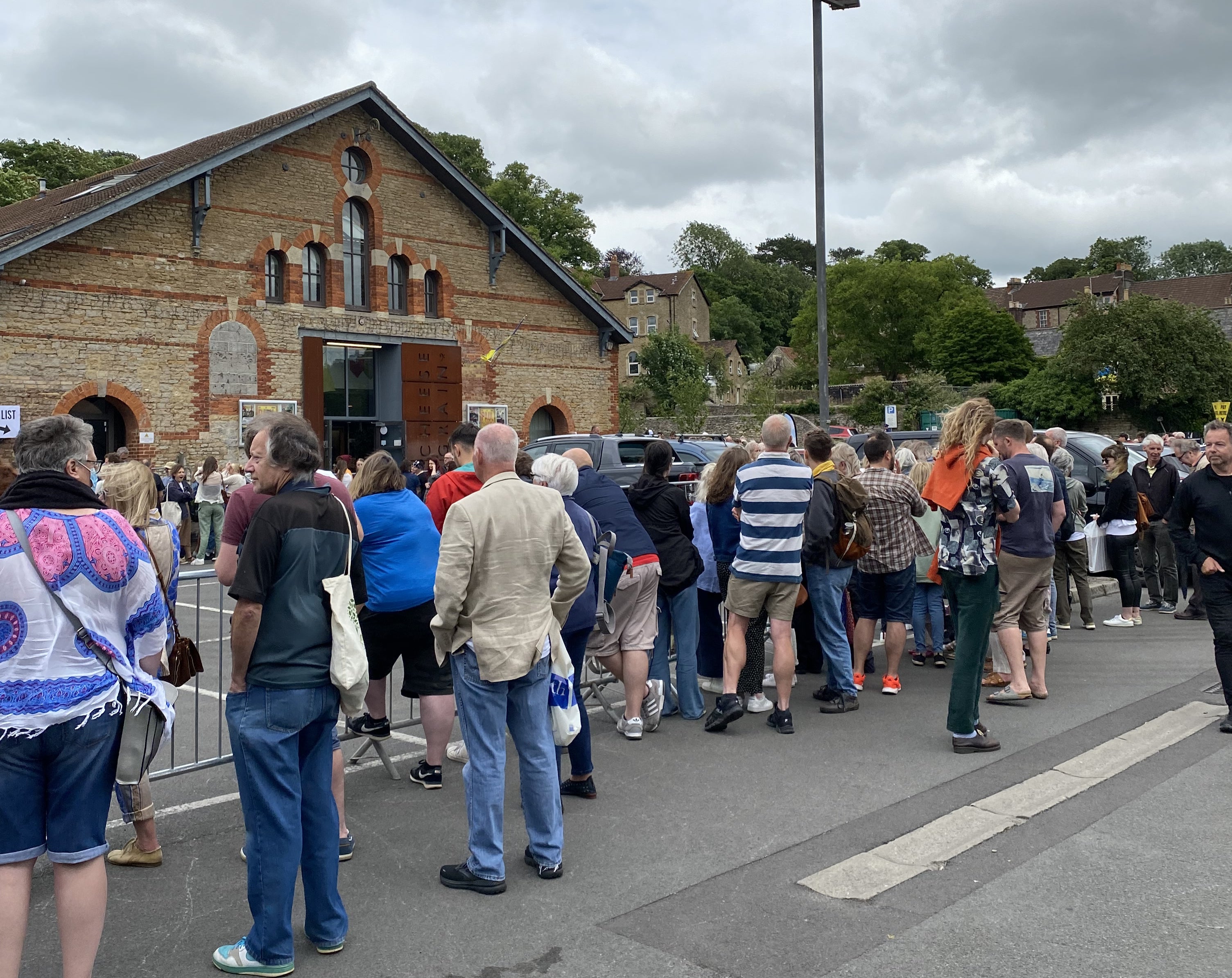 Crowds gather outside the Cheese and Grain in Frome, Somerset, to see Paul McCartney who is playing a warm-up gig the night before he headlines Glastonbury (Connie Evans/PA)