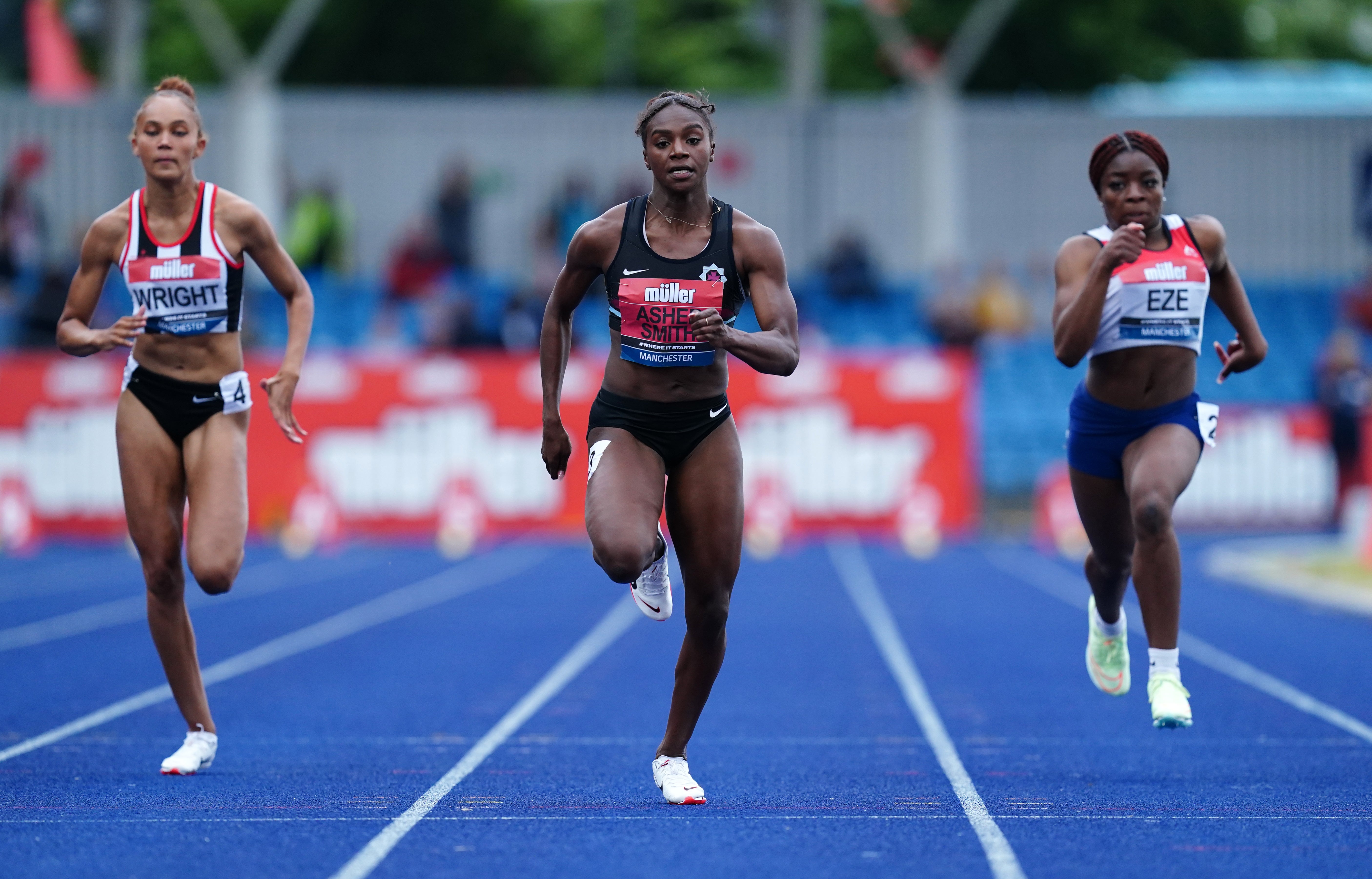 Dina Asher-Smith leads her heat