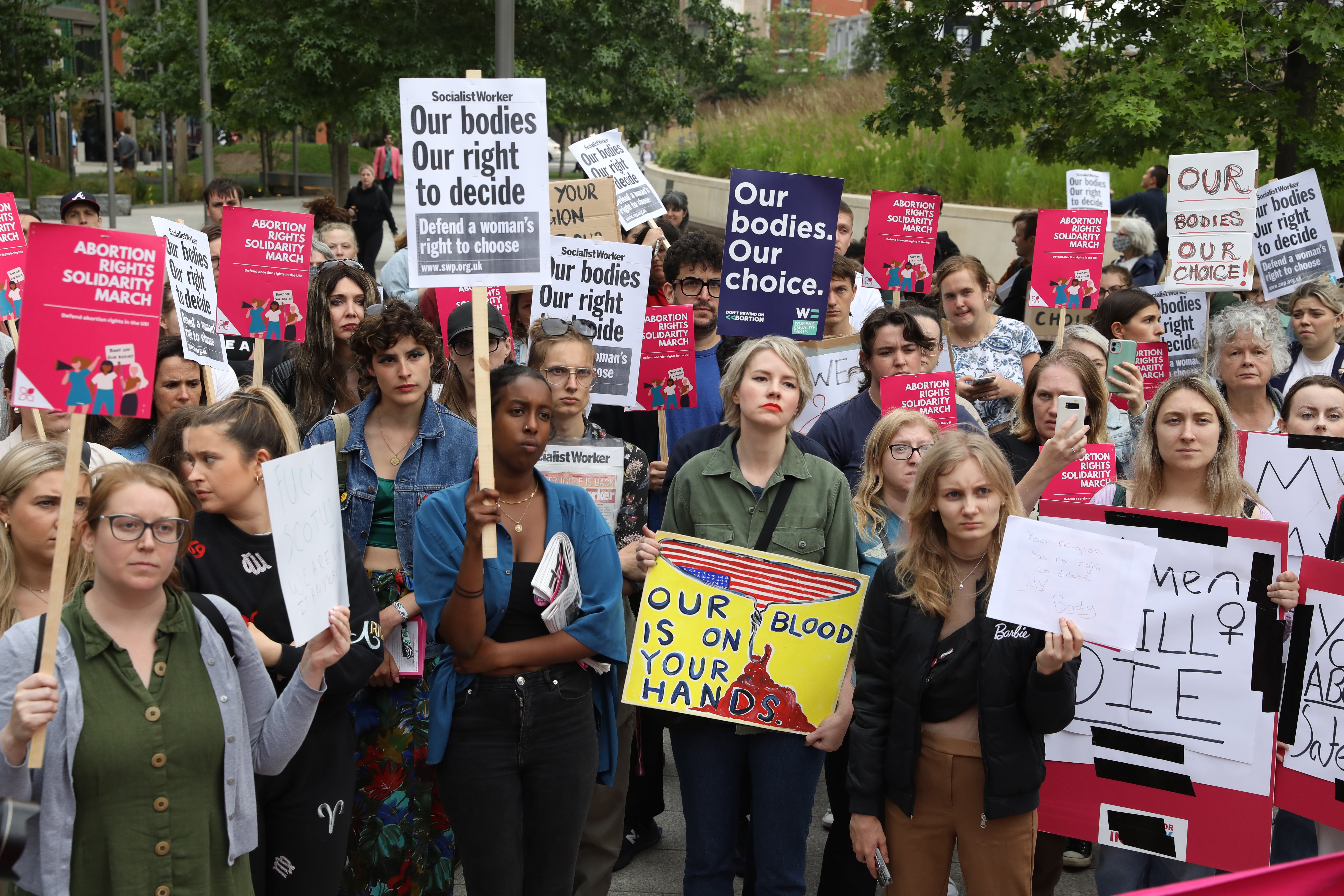 Demonstrators gather outside the United States embassy in Vauxhall, south London to protest against the decision to scrap constitutional right to abortion (Ashlee Ruggels/PA)