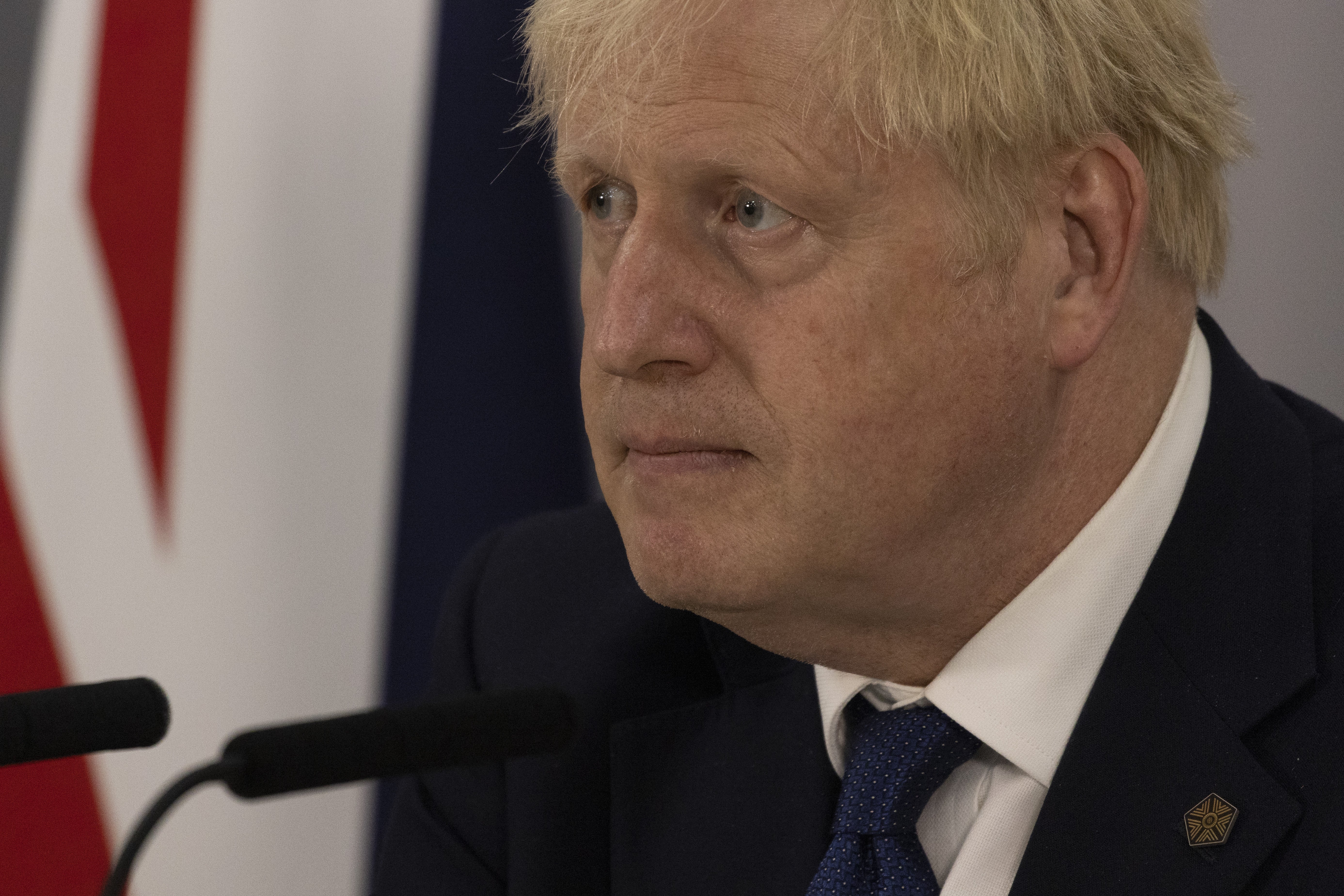 Prime Minister Boris Johnson is facing criticism from opponents and party grandees back in the UK (Dan Kitwood/PA)