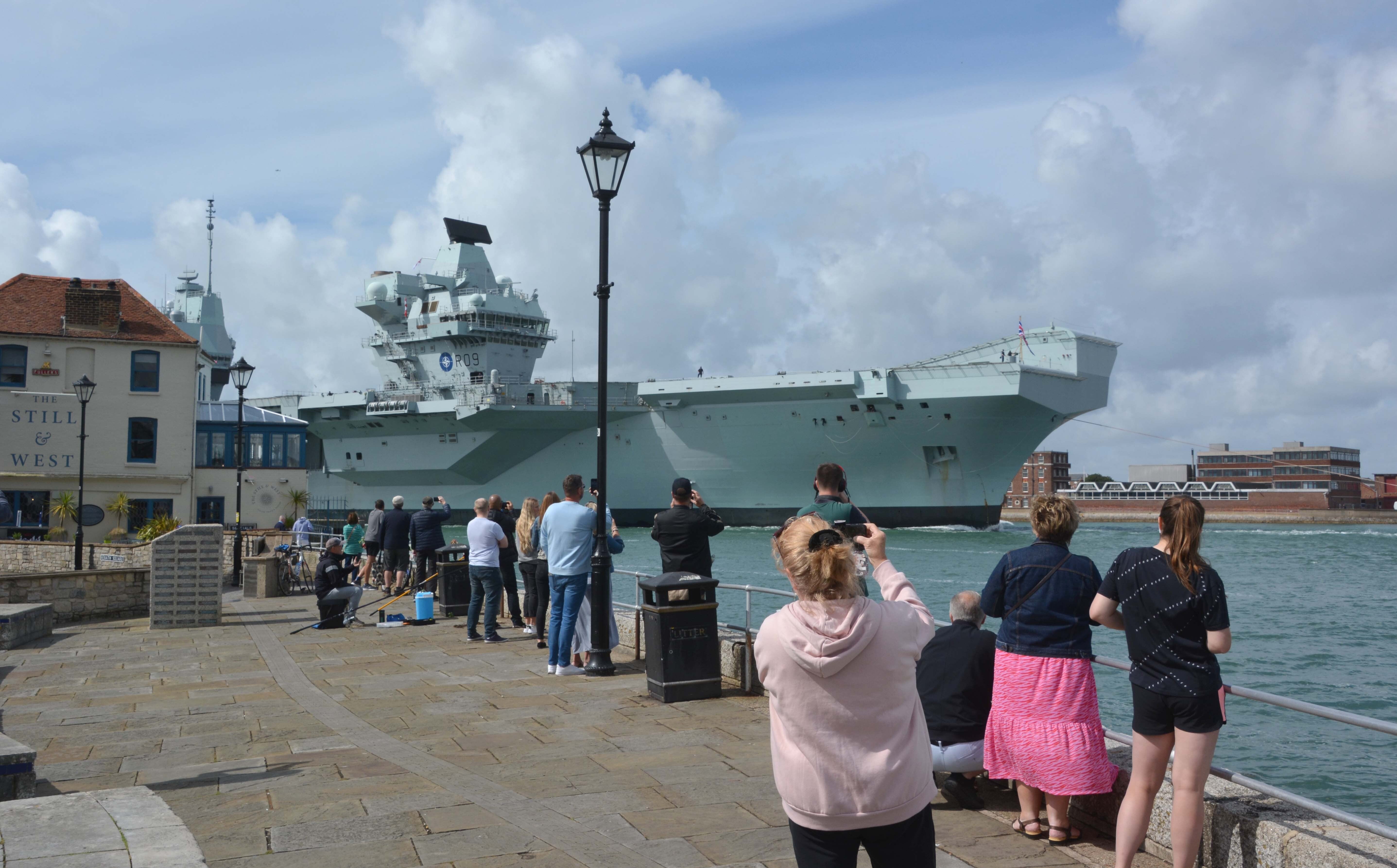 Royal Navy aircraft carrier HMS Prince of Wales returns to Portsmouth Naval Base after completing exercises off the Spanish Atlantic coast (Ben Mitchell/PA)