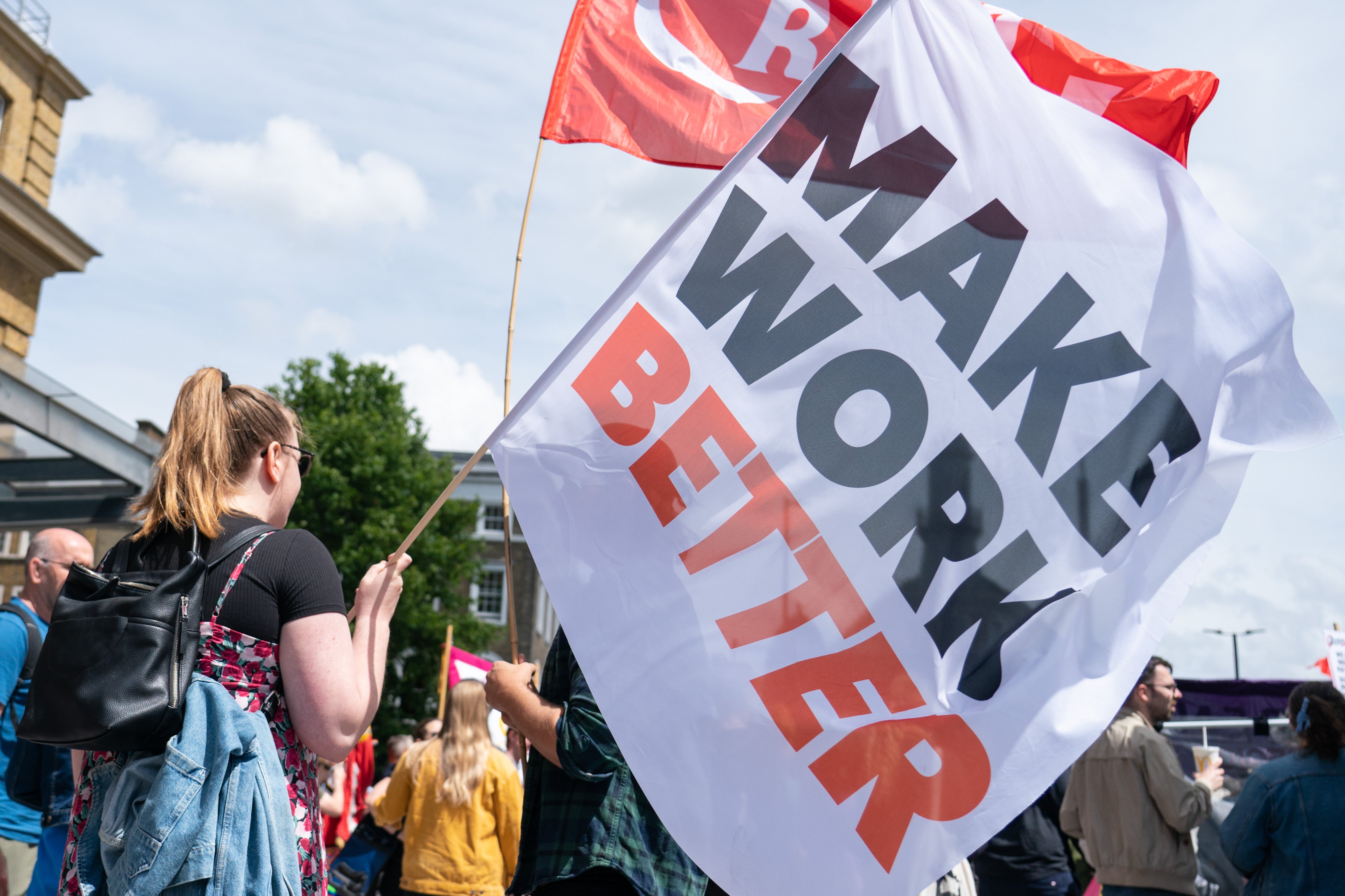 Protesters attend a rally outside King’s Cross station, London (Dominic Lipinski/PA)