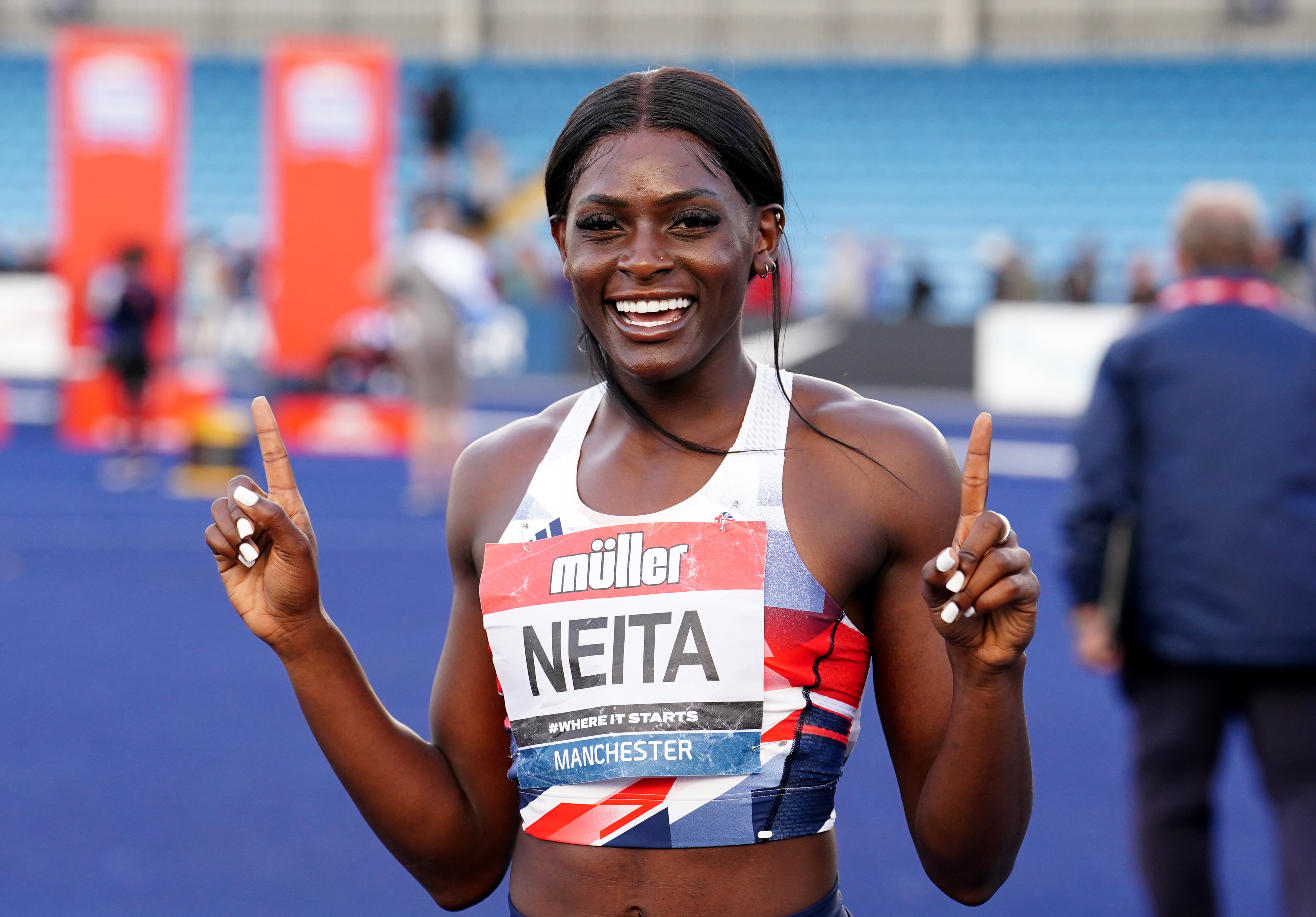 Daryll Neita celebrates winning the 100m in Manchester (Martin Rickett/PA)