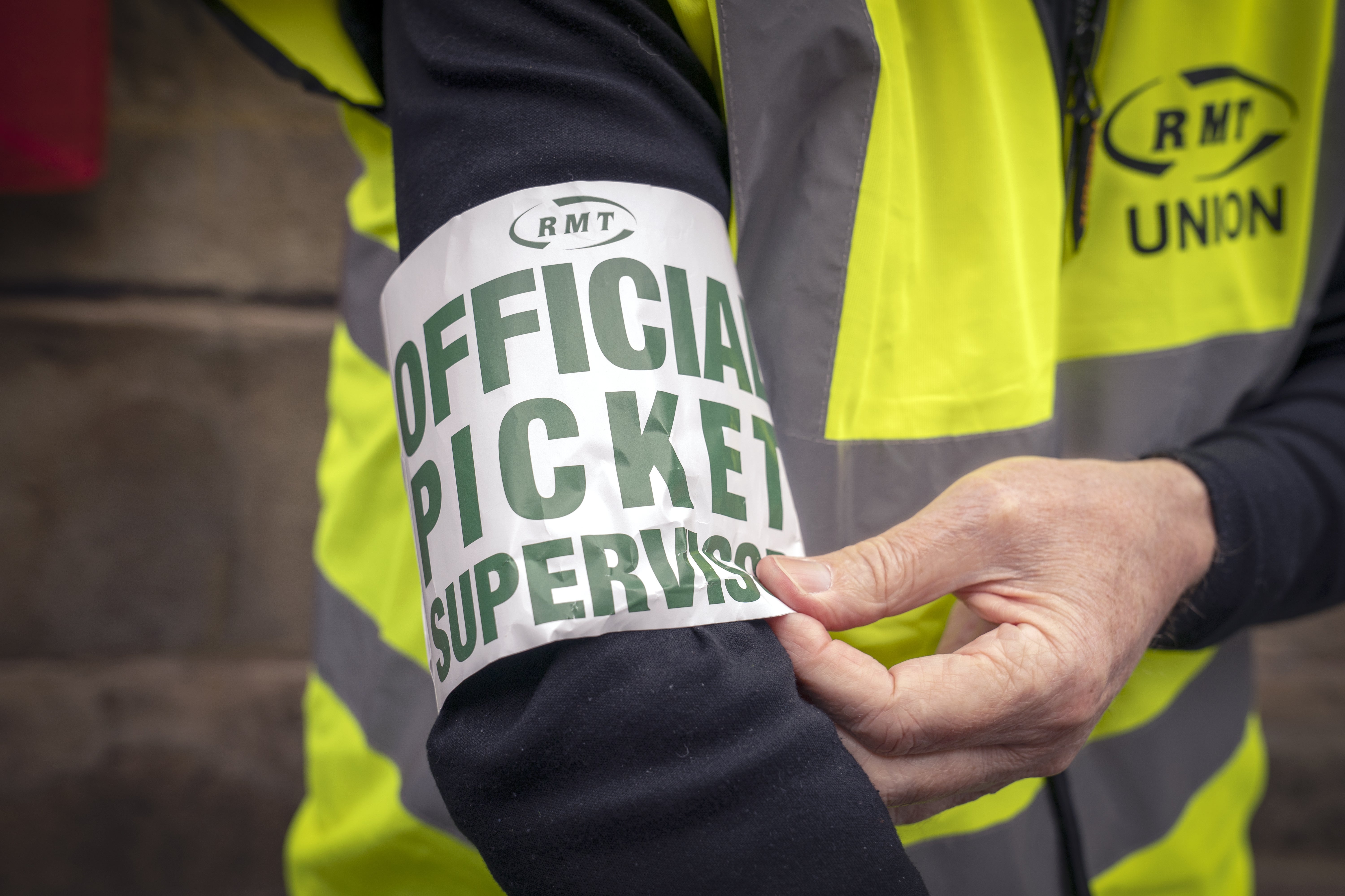 A picket line outside Edinburgh’s Waverley Station (Jane Barlow/PA)