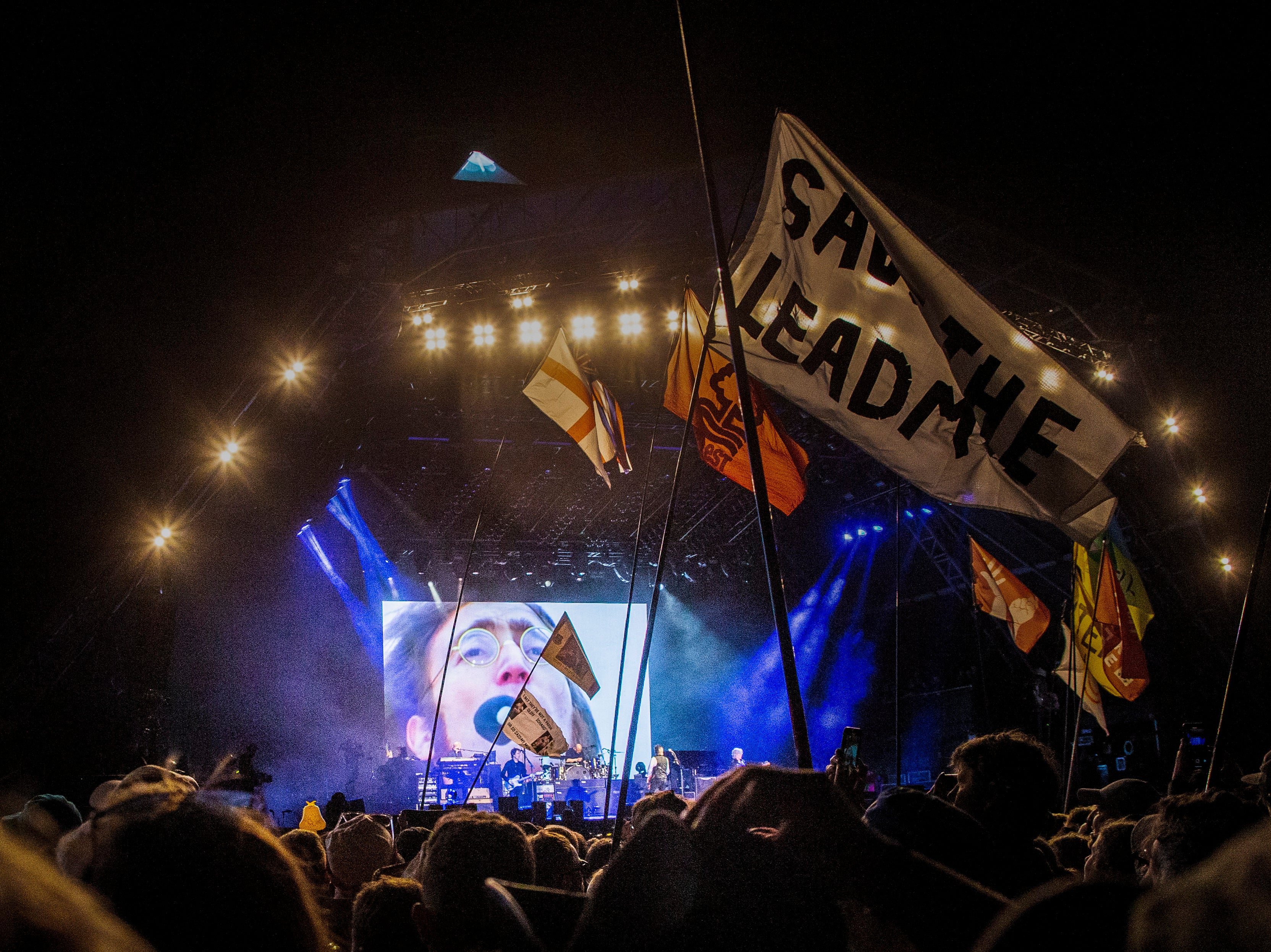 Paul McCartney performs while visuals and the vocals of John Lennon play