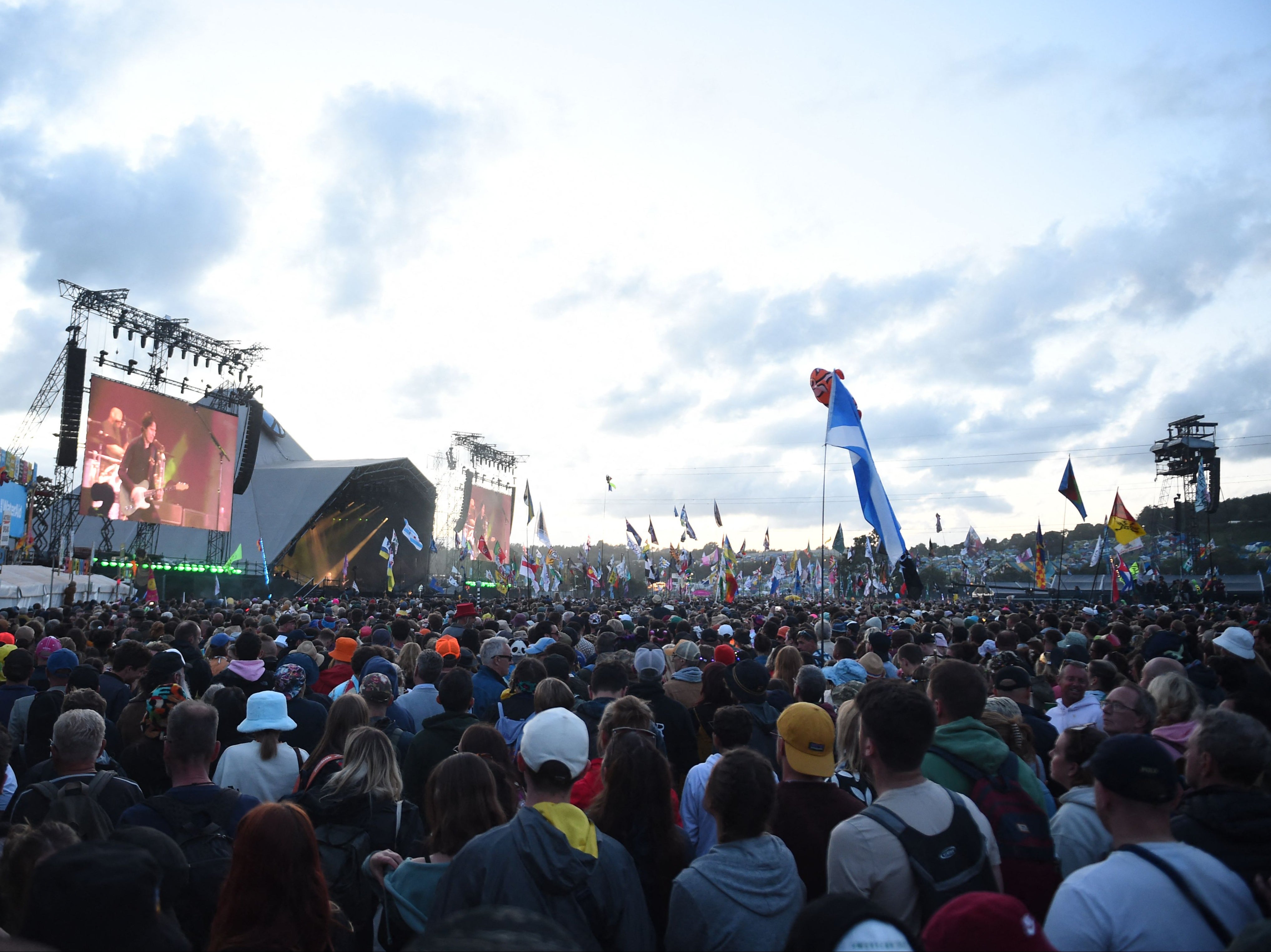 A crowd gathers to watch Paul McCartney on Glastonbury’s Pyramid Stage