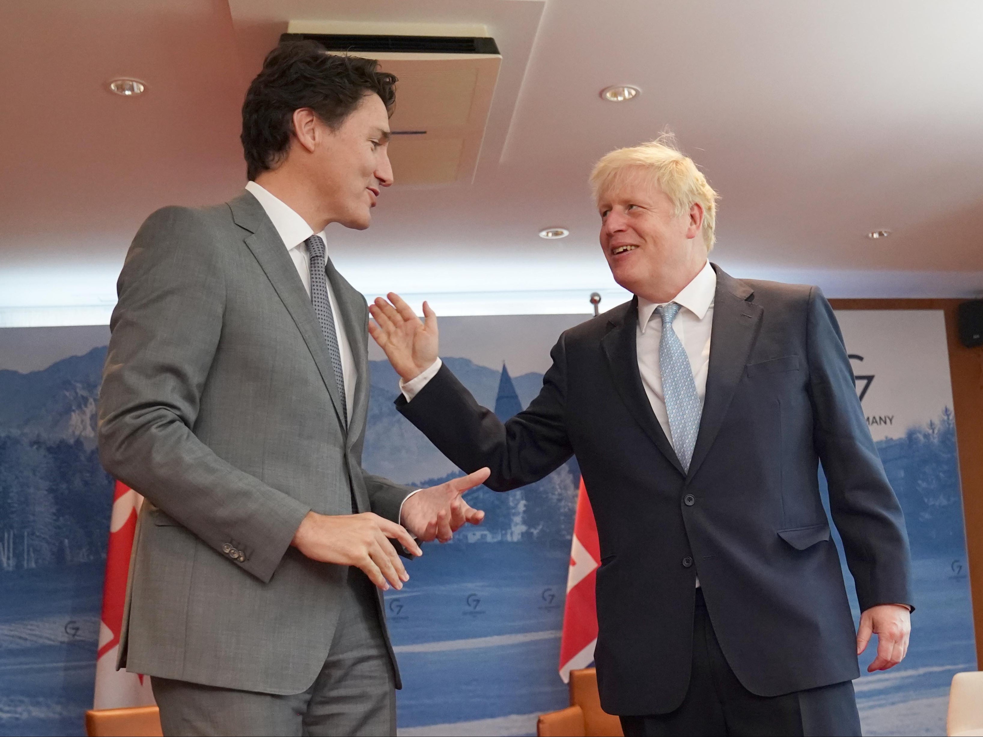 Boris Johnson jokes with Canadian PM Justin Trudeau at G7