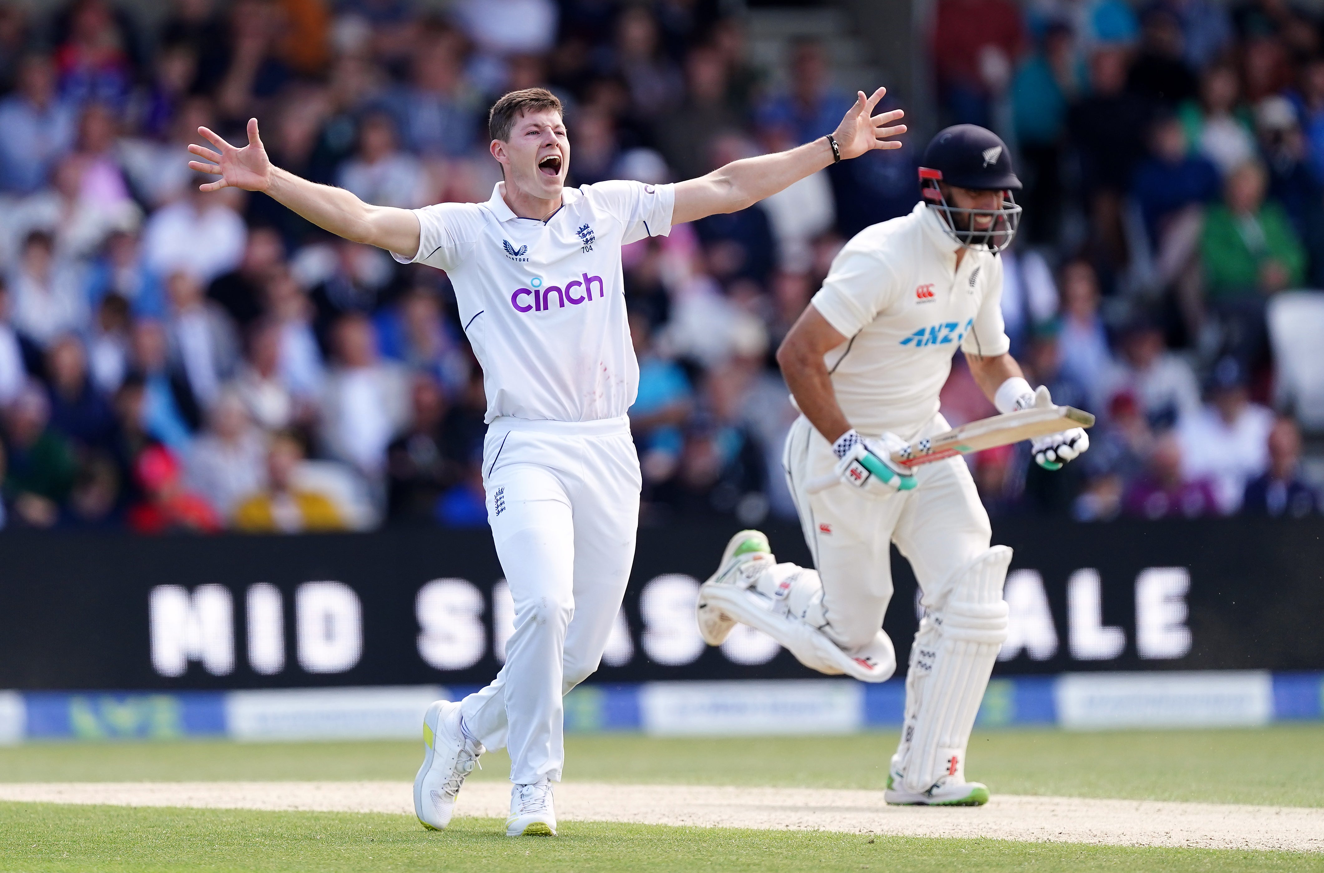 Matthew Potts celebrates the wicket of in-form New Zealand batter Daryl Mitchell