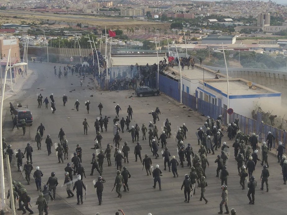 Hundreds of migrants crossing the Spanish and Morocco Melilla border near Nador, Morocco