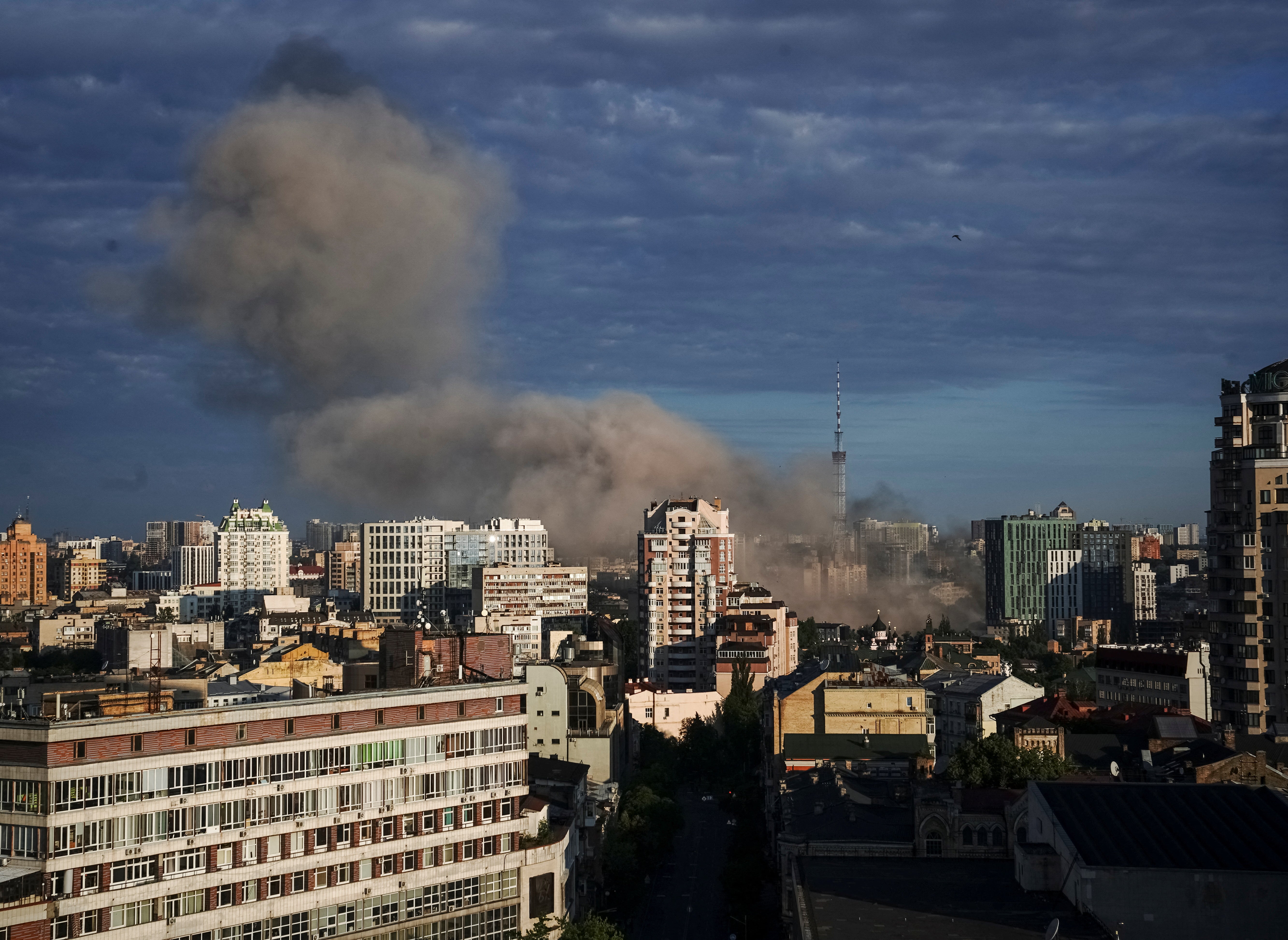 Smoke rises after a missile strike in Kyiv on Sunday morning