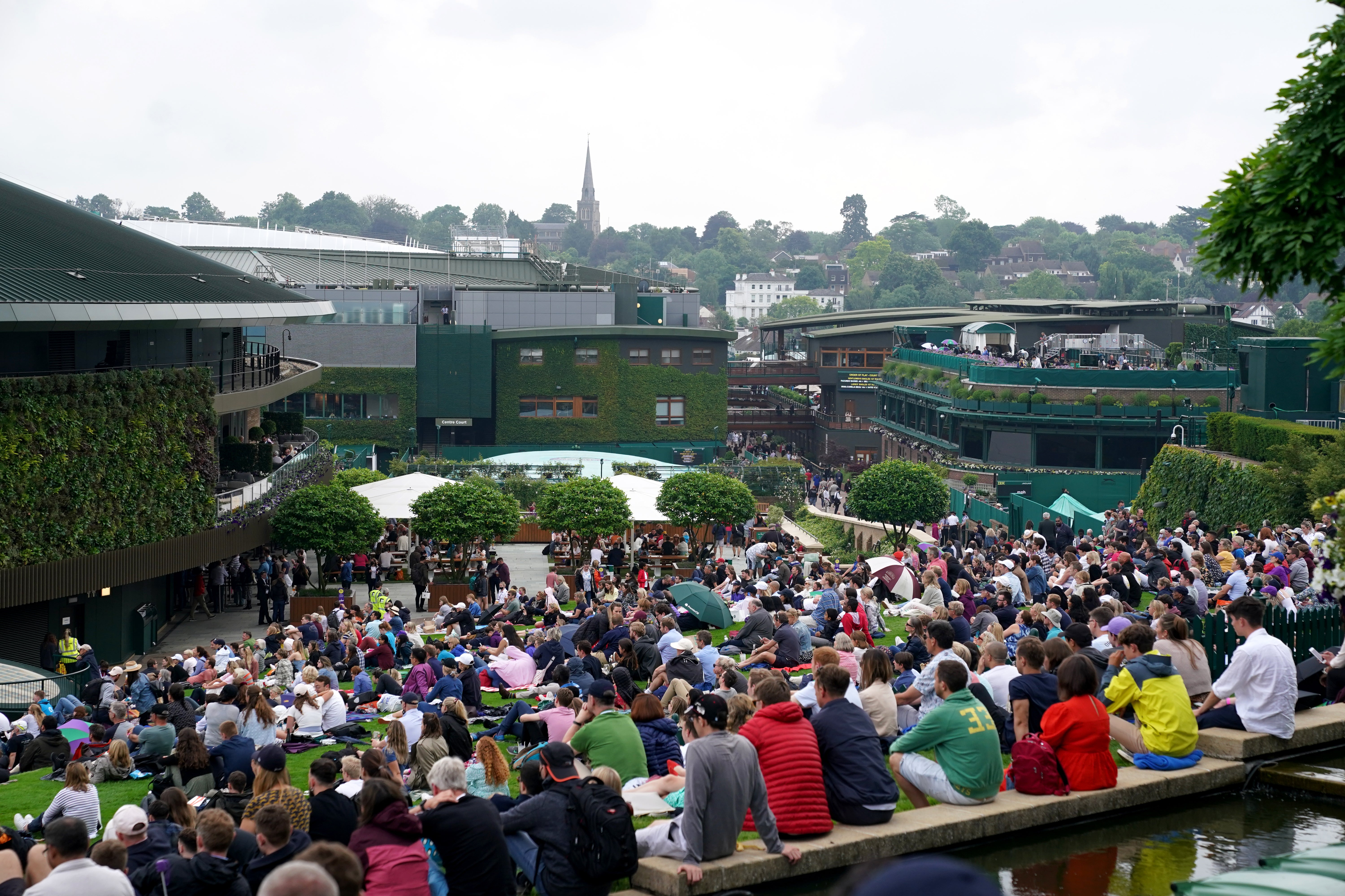 Fans on Murray Mound watching the action on Centre Court (Adam Davy/PA)