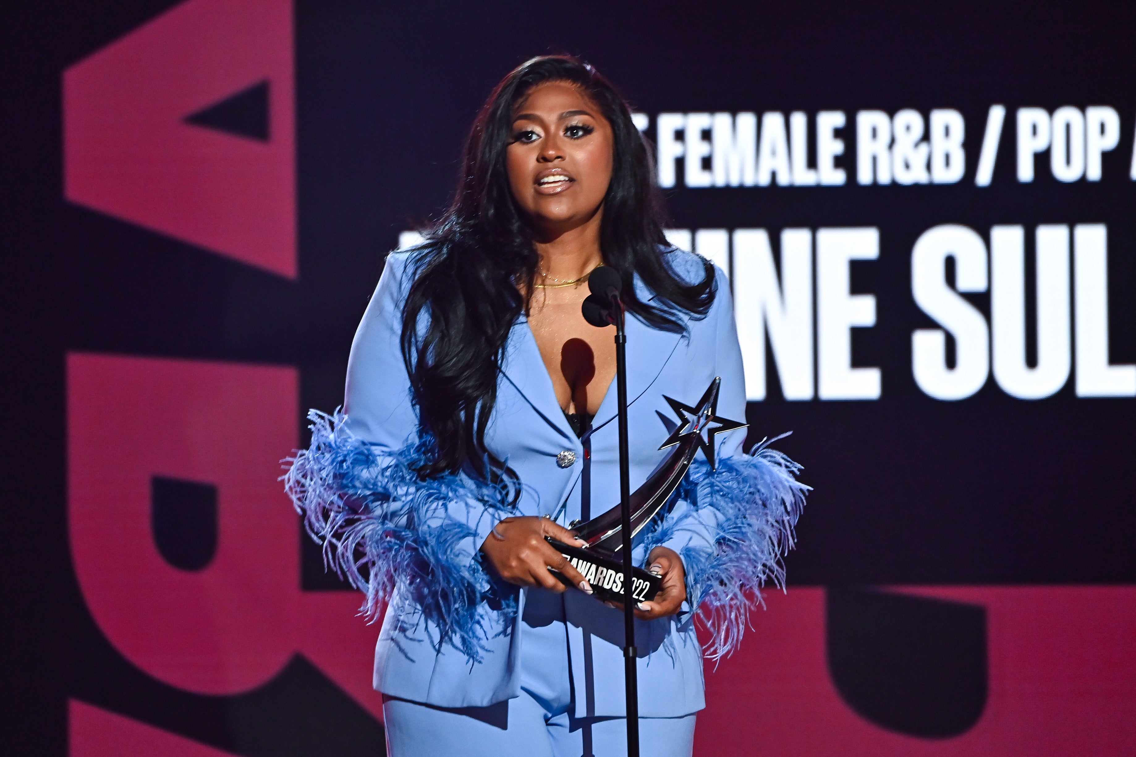 Jazmine Sullivan accepts the Best Female R&B/Pop Artist award onstage during the 2022 BET Awards