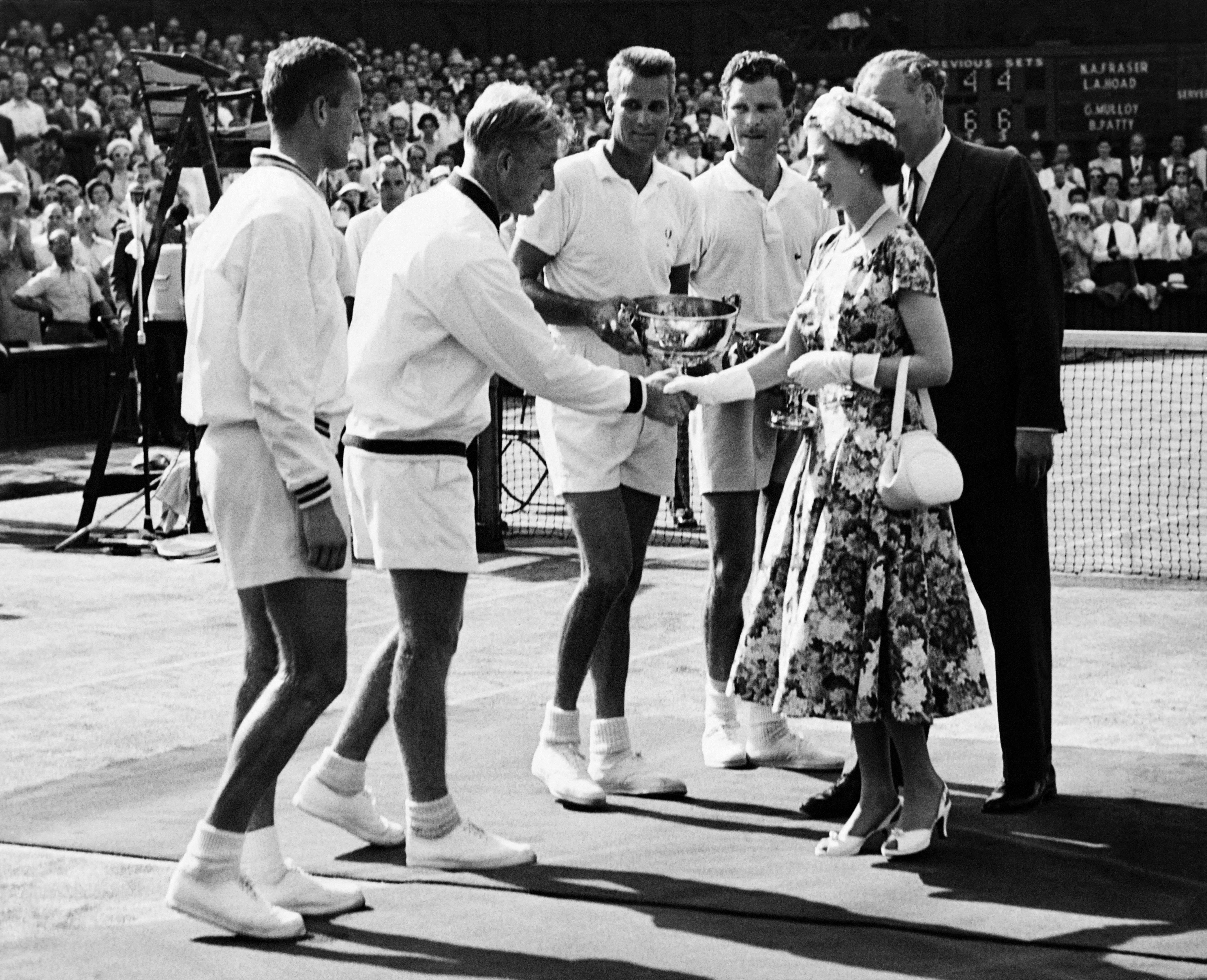 Queen Elizabeth II congratulates Tennis players during 1957 Wimbledon Championships tennis tournament on July 1957