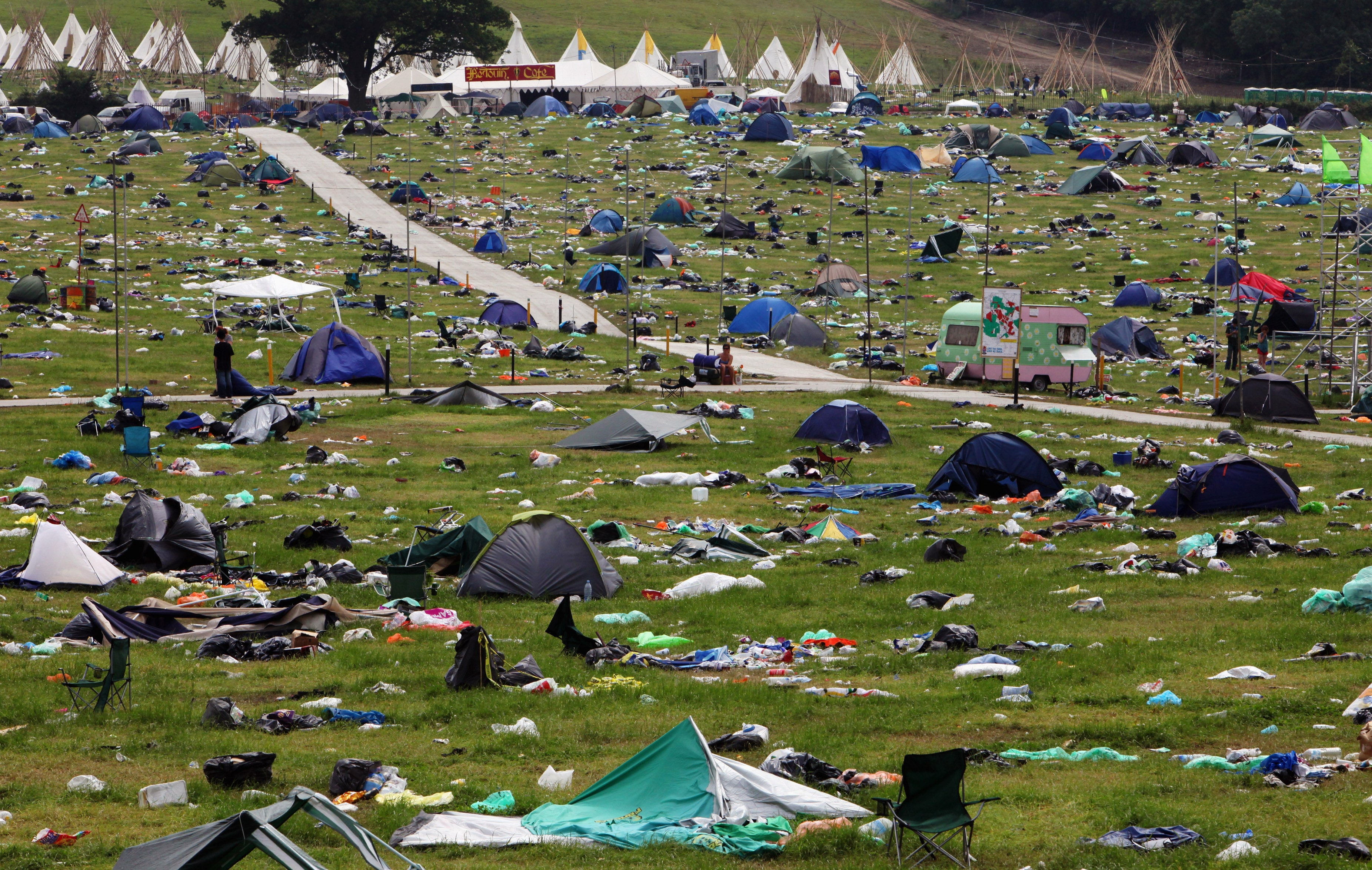 Discarded tents and rubbish at the start of the clean up in 2009