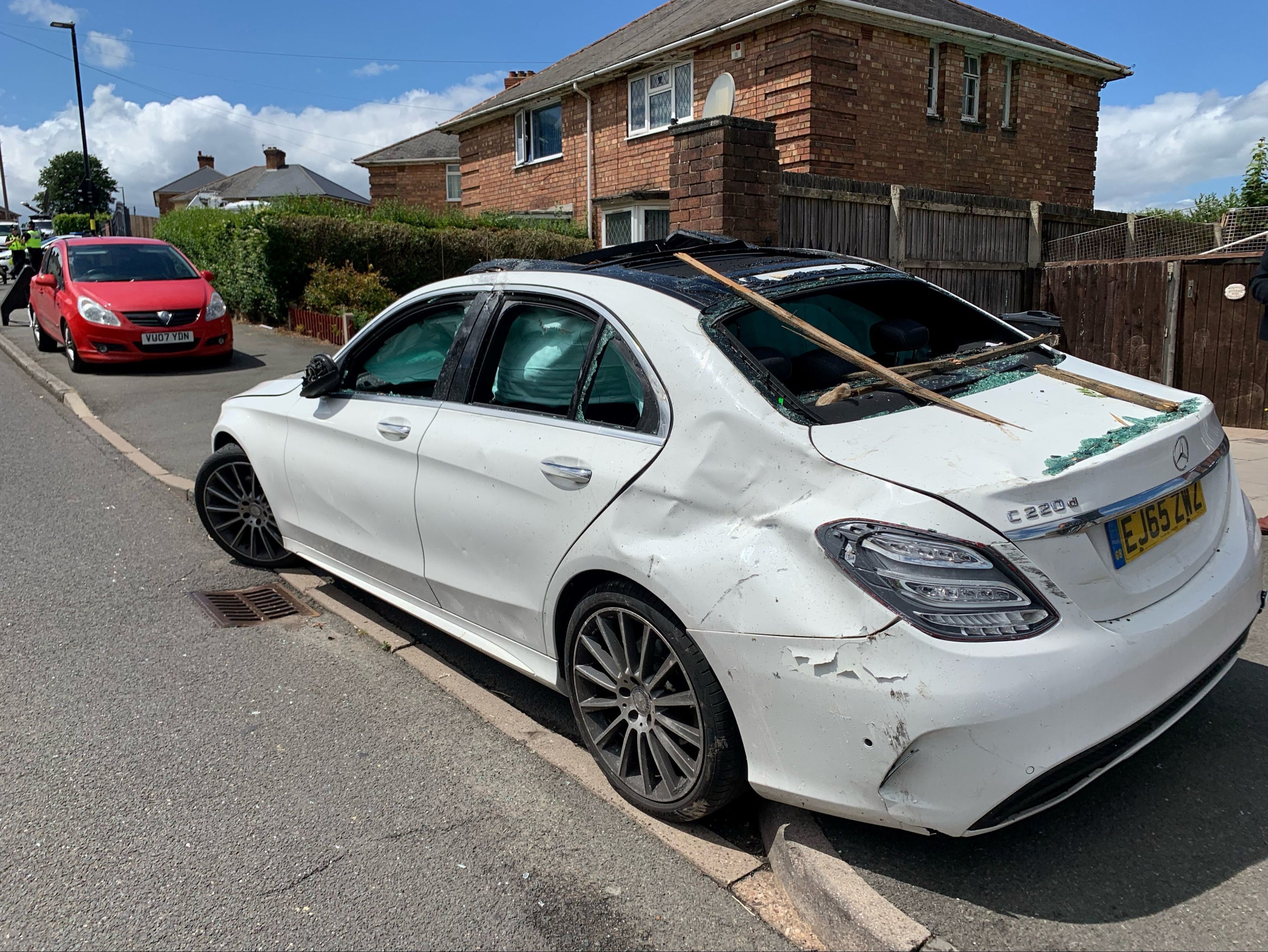 A passing car was damaged at the time of the gas blast