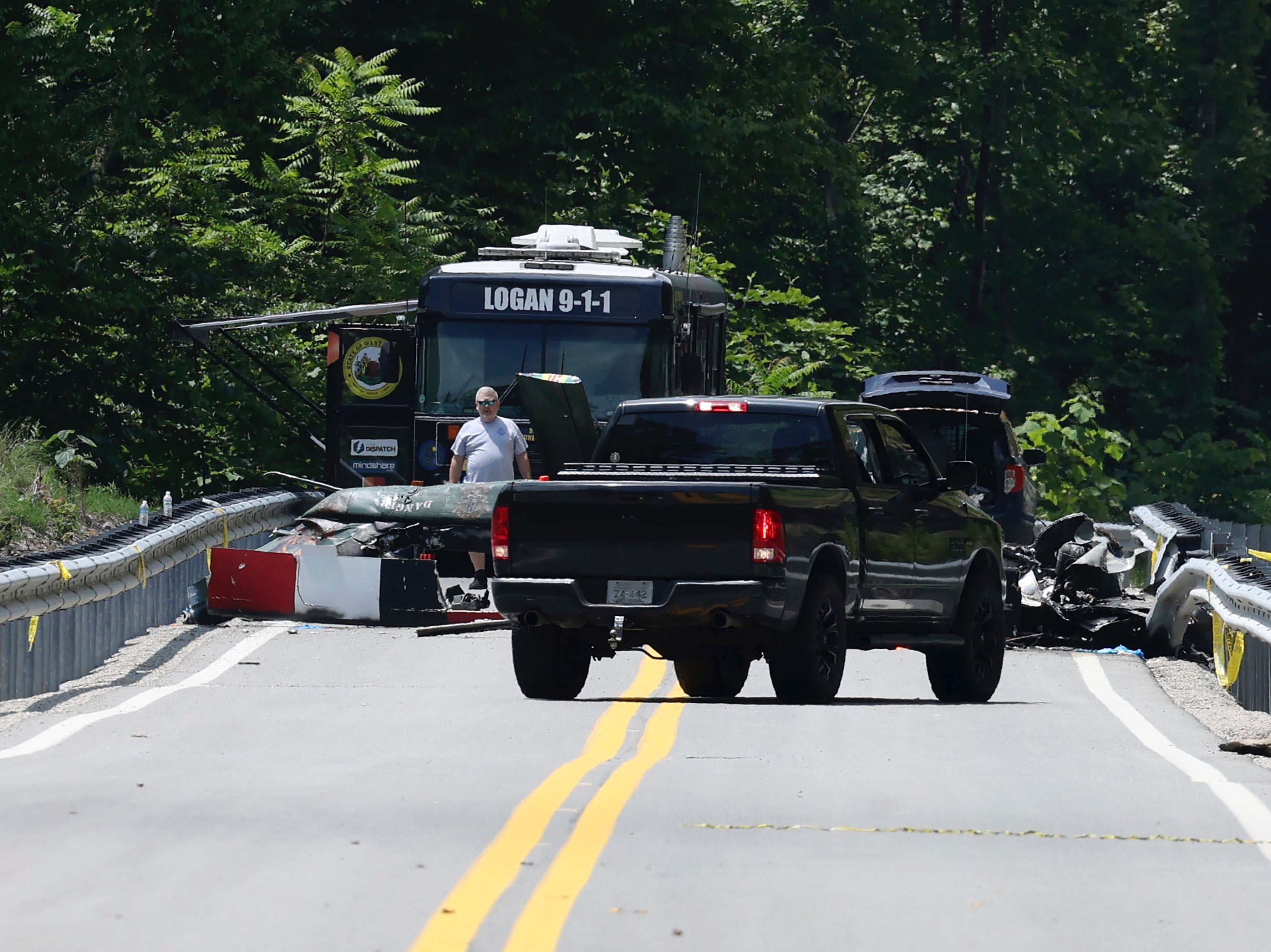 Emergency personnel at the scene of the helicopter crash in Logan County, WV