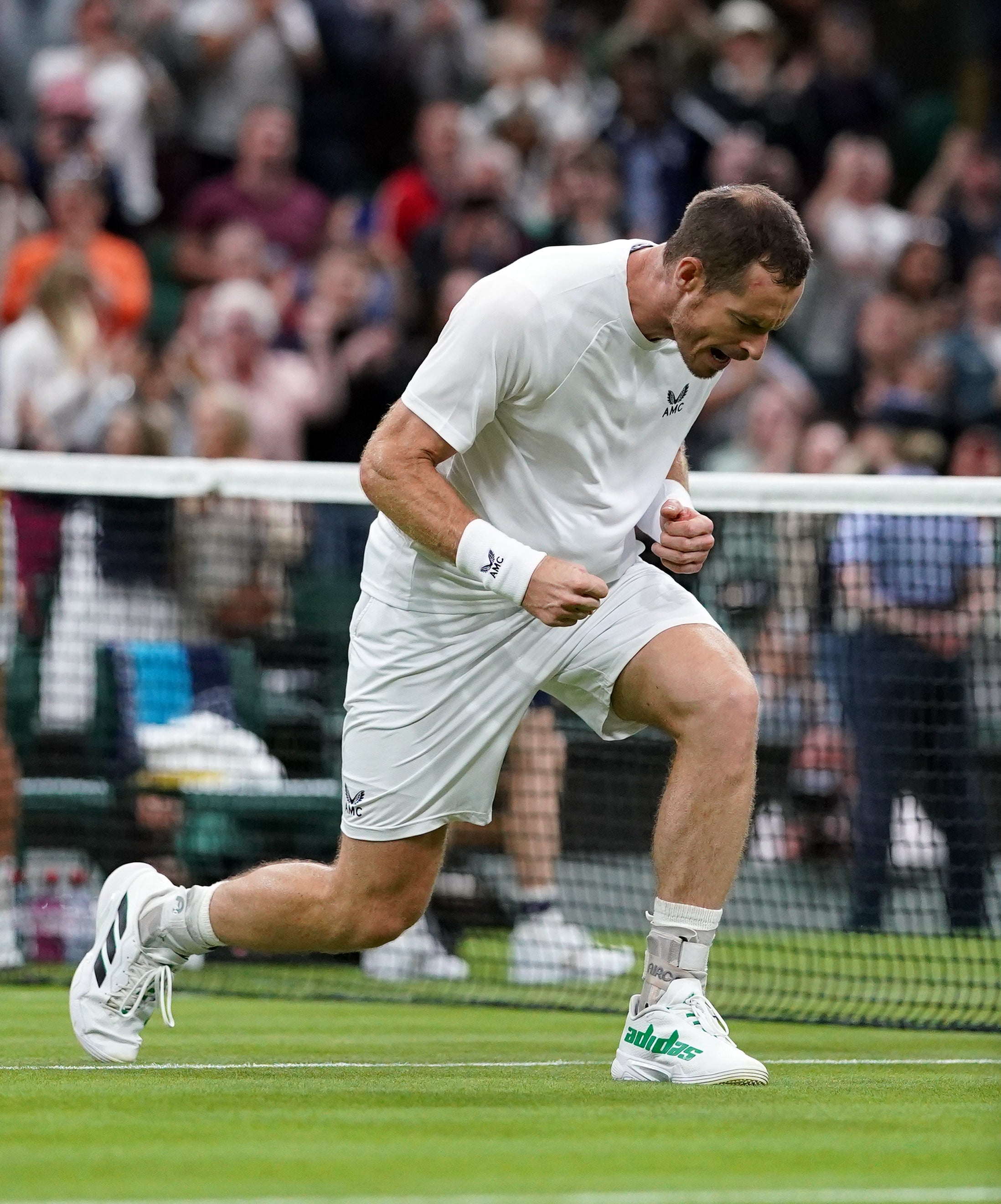 Andy Murray clenches his fists after booking his spot in round two (Adam Davy/PA)