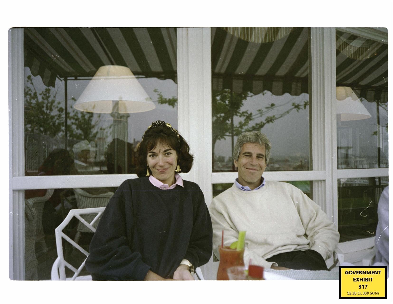 Undated handout file photo issued by US Department of Justice of Ghislaine Maxwell with Jeffrey Epstein, which has been shown to the court during the sex trafficking trial of Maxwell in the Southern District of New York. British socialite Ghislaine Maxwell has been convicted of helping American financier Jeffrey Epstein sexually abuse teenage girls. (US Department of Justice/PA)